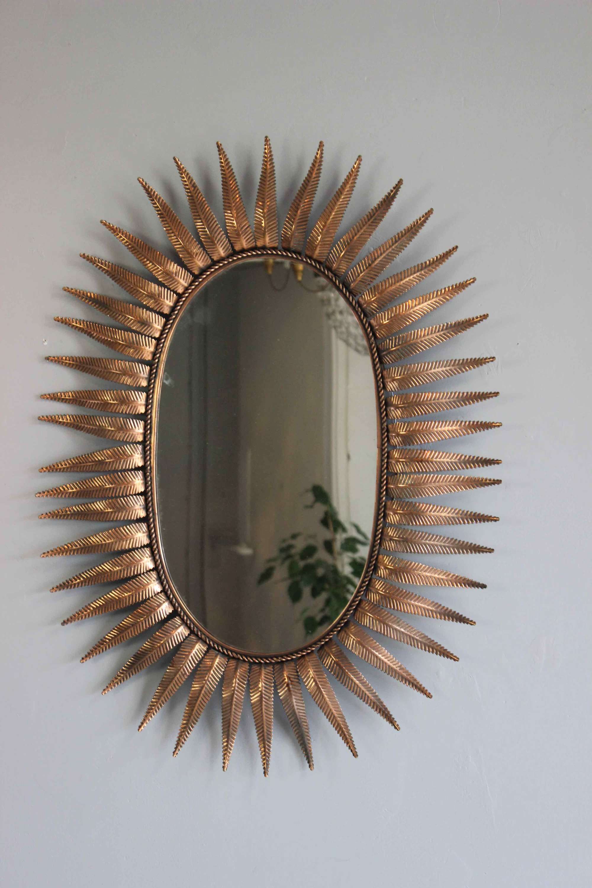 Pretty coppery oval  Spanish mirror