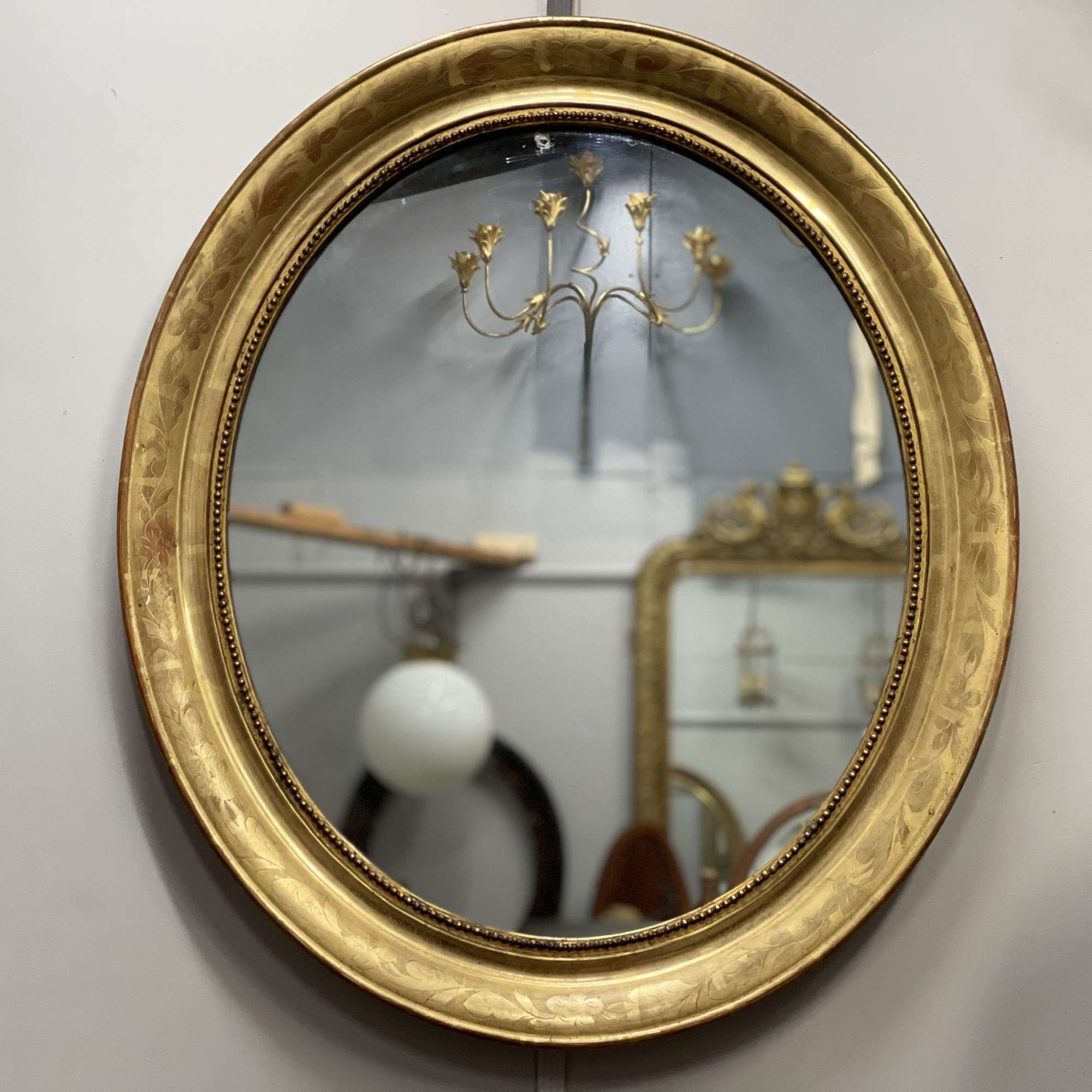 French Oval Figured Gilt Antique Mirror With Original Glass