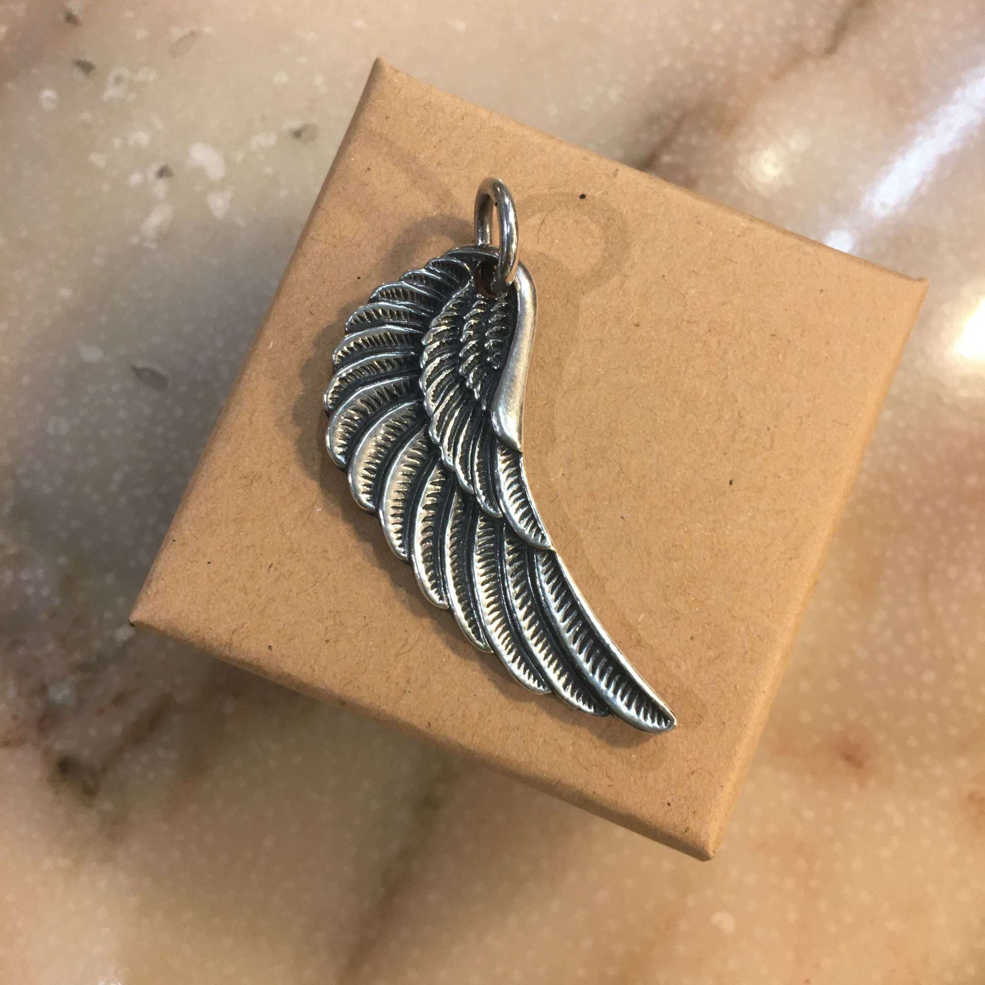 Silver Service sterling silver  wing pendant