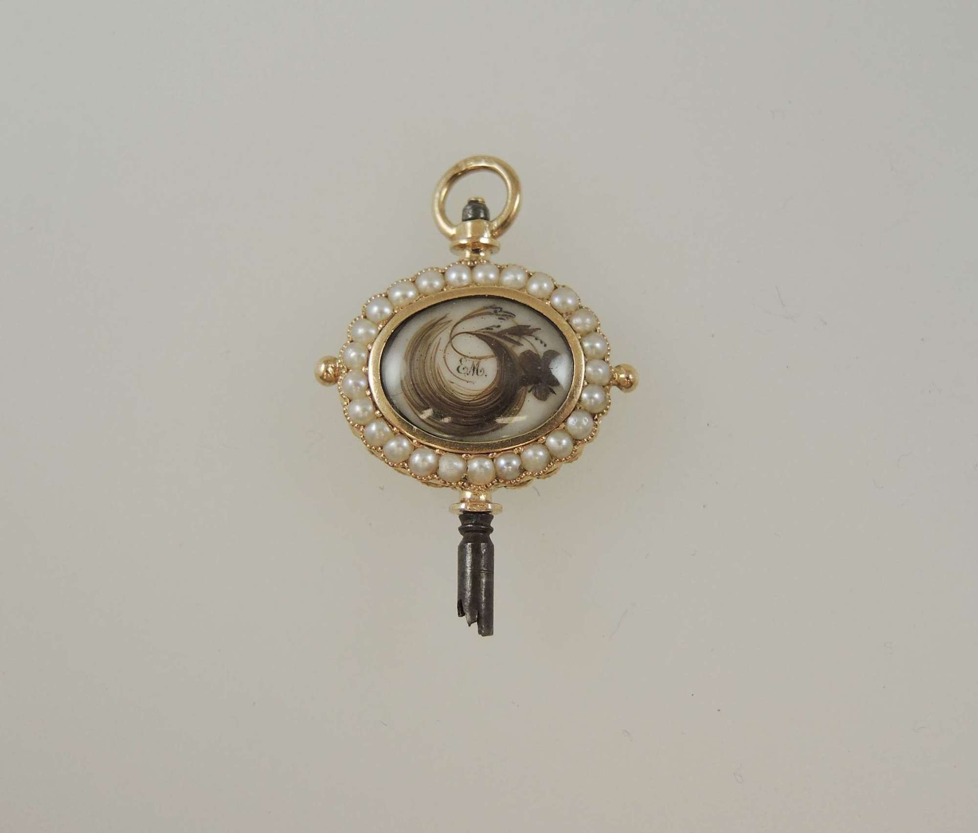 Solid gold pearl set Memento Mori pocket watch key in miniature c1810