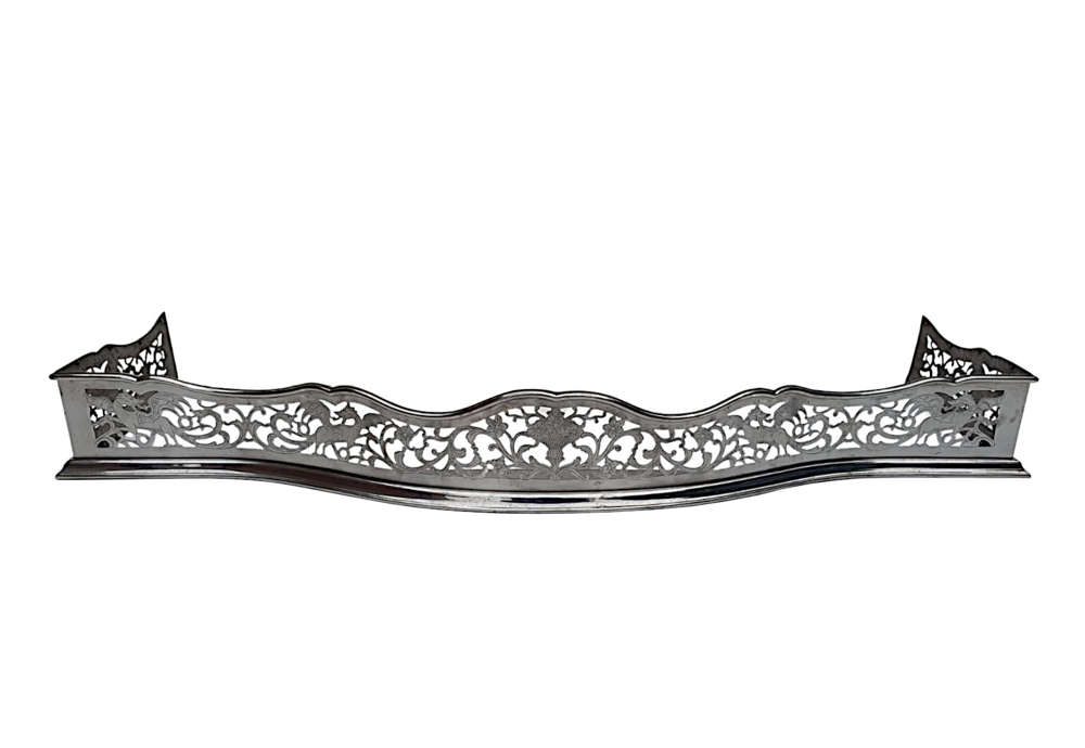 A Rare 19th Century Polished Steel Fender With Flower And Dragon Detail