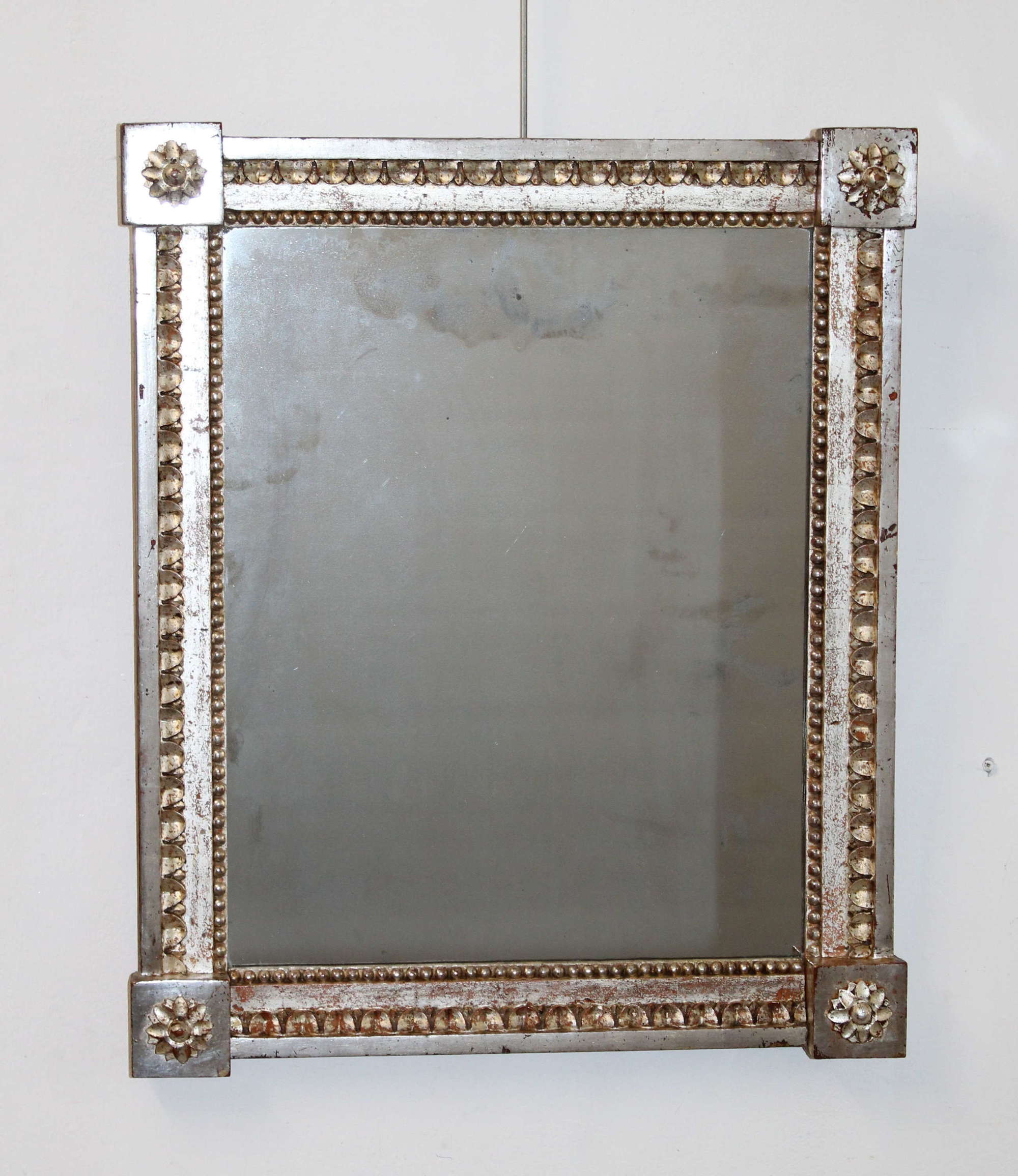 Small 18th century French carved silverleafed framed mirror