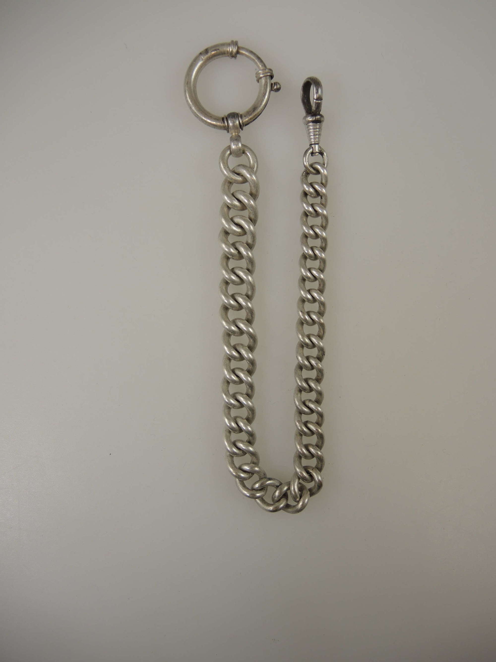 Good quality simple silver watch chain c1890