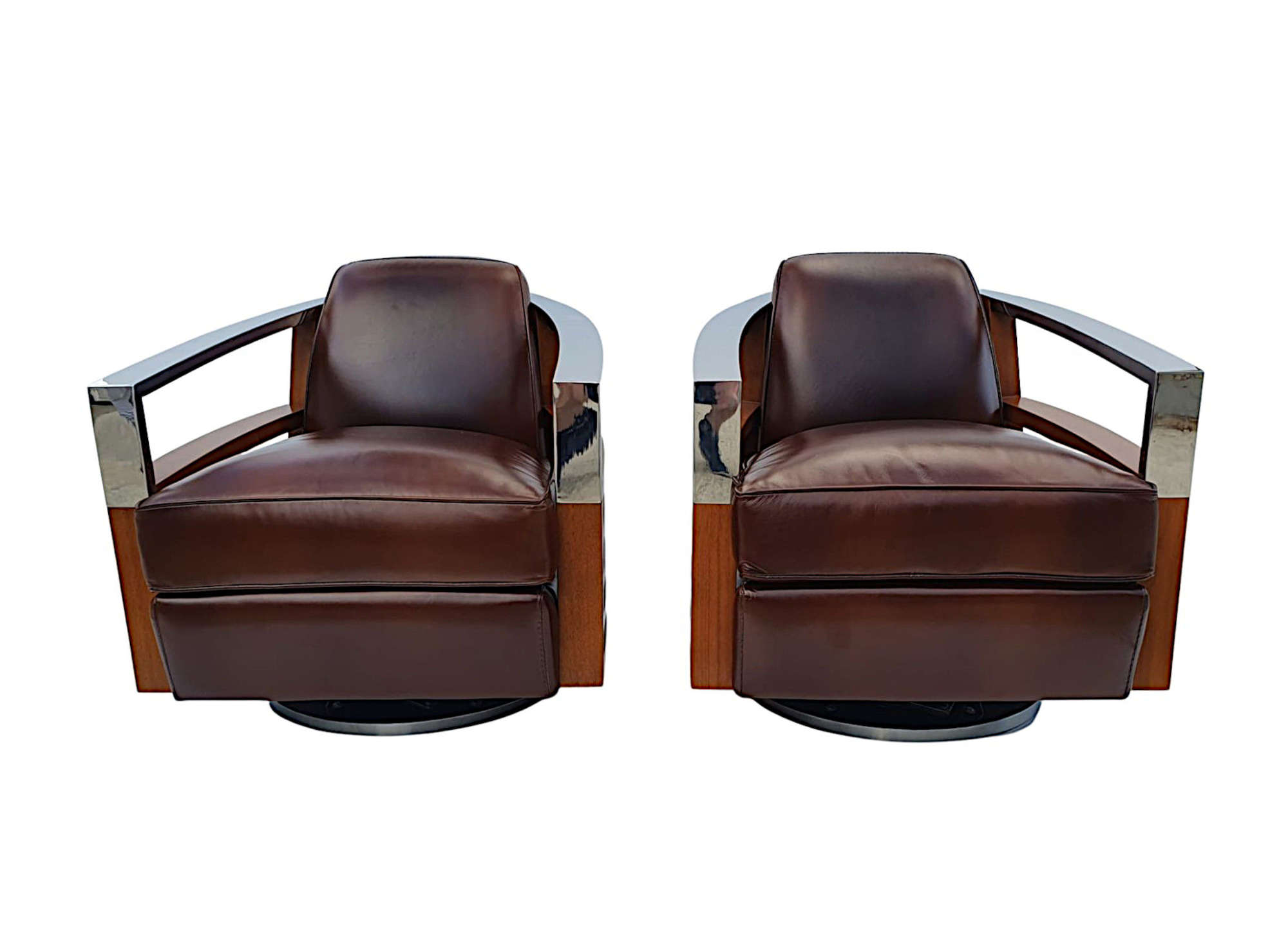 A Stunning Quality Pair of Contemporary Revolving Armchairs in the Art Deco Style