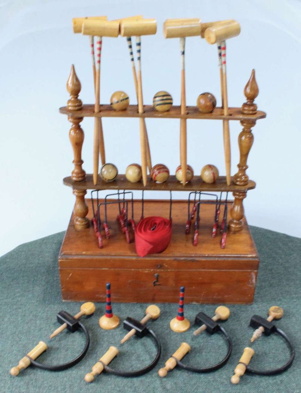 A VICTORIAN TABLE CROQUET SET