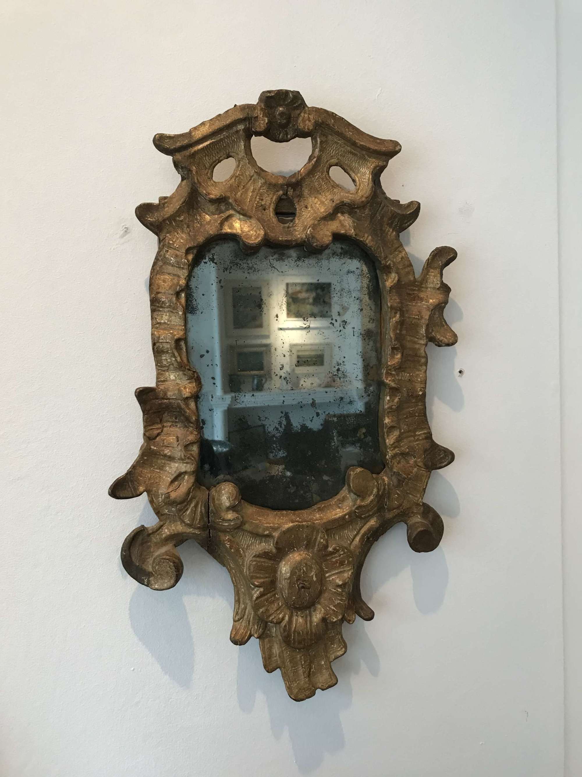 Carved and gilded 18th century Florentine mirror