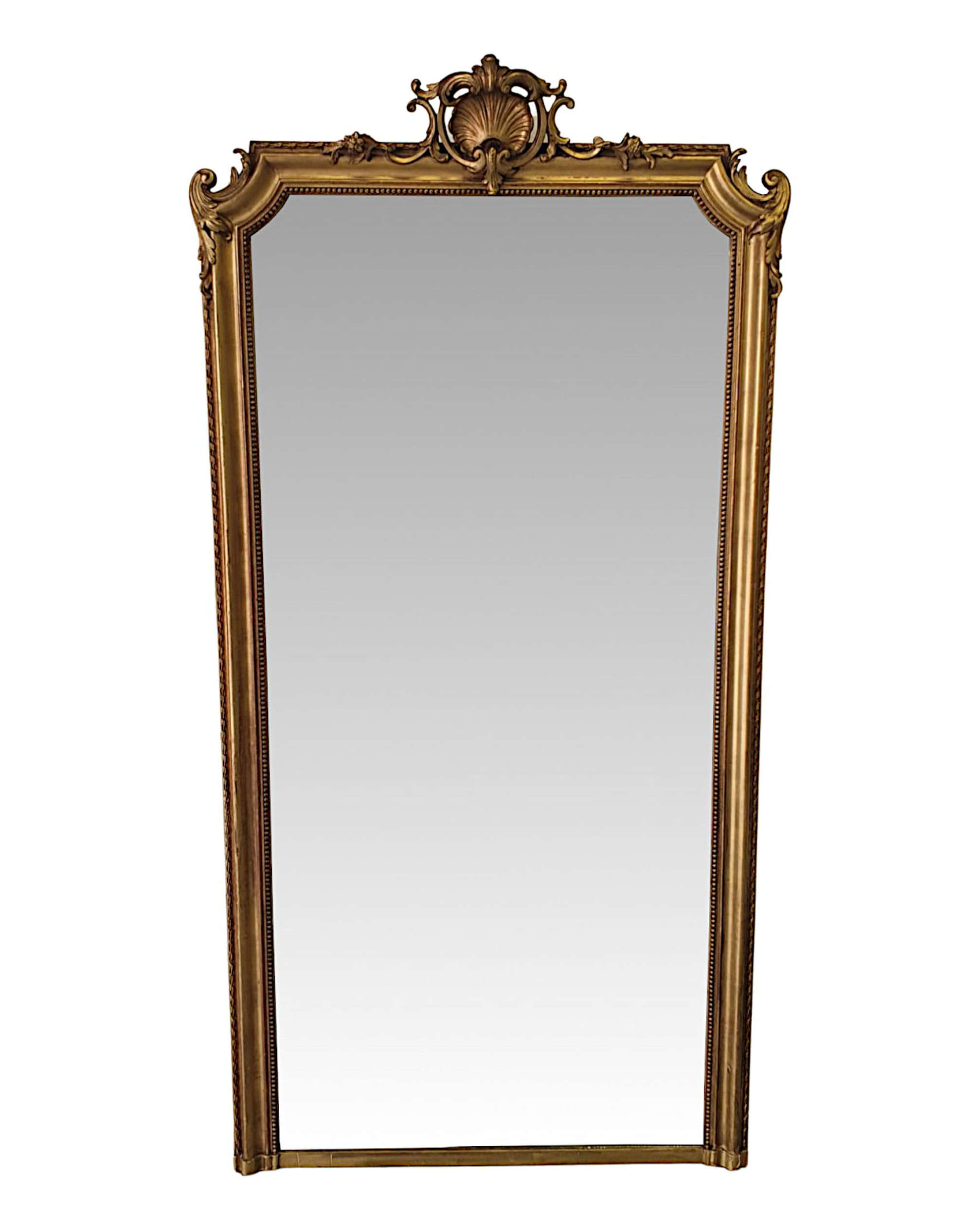 A Superb Tall 19th Century Giltwood Dressing or Leaner Mirror