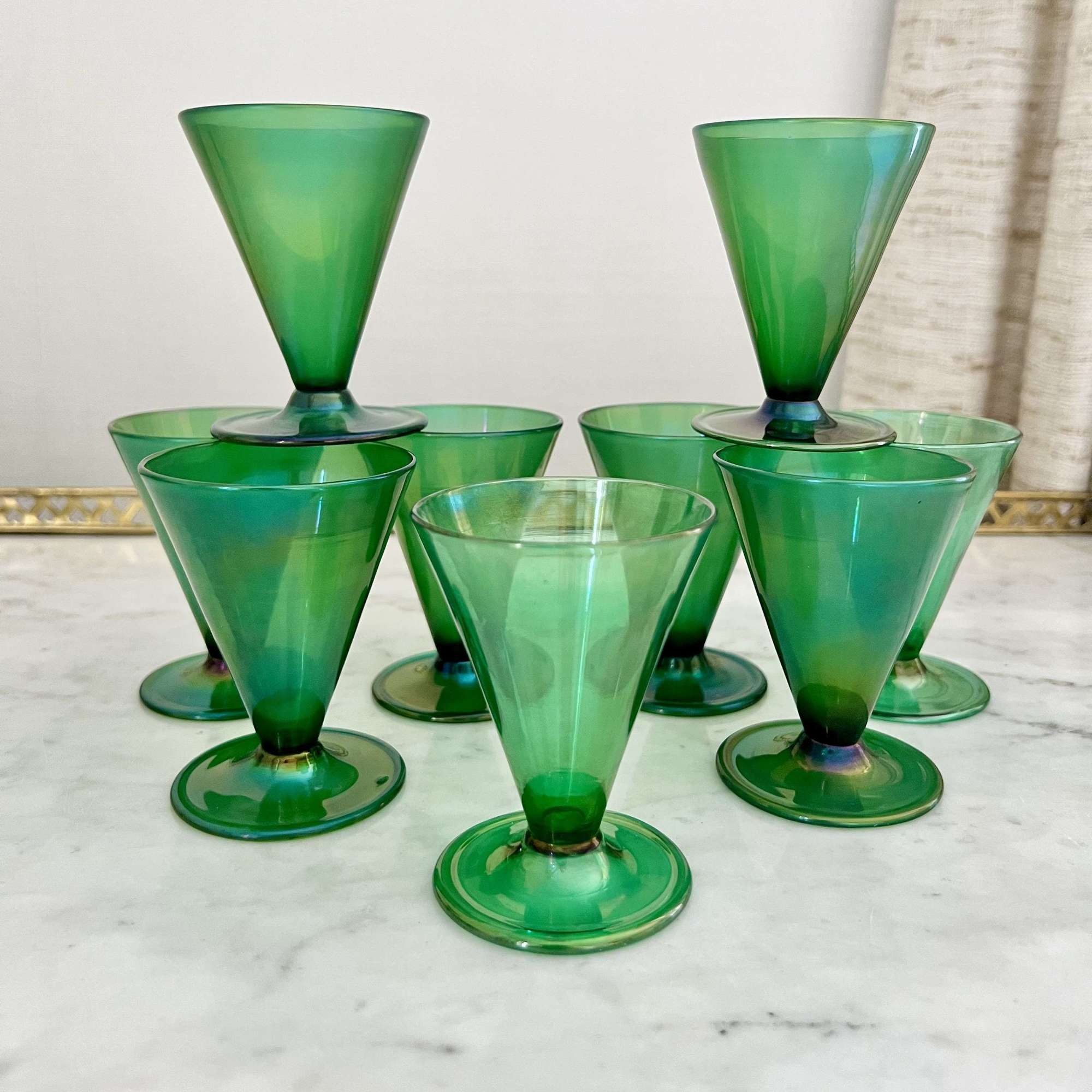 Set of small Art Deco emerald green lustre glasses