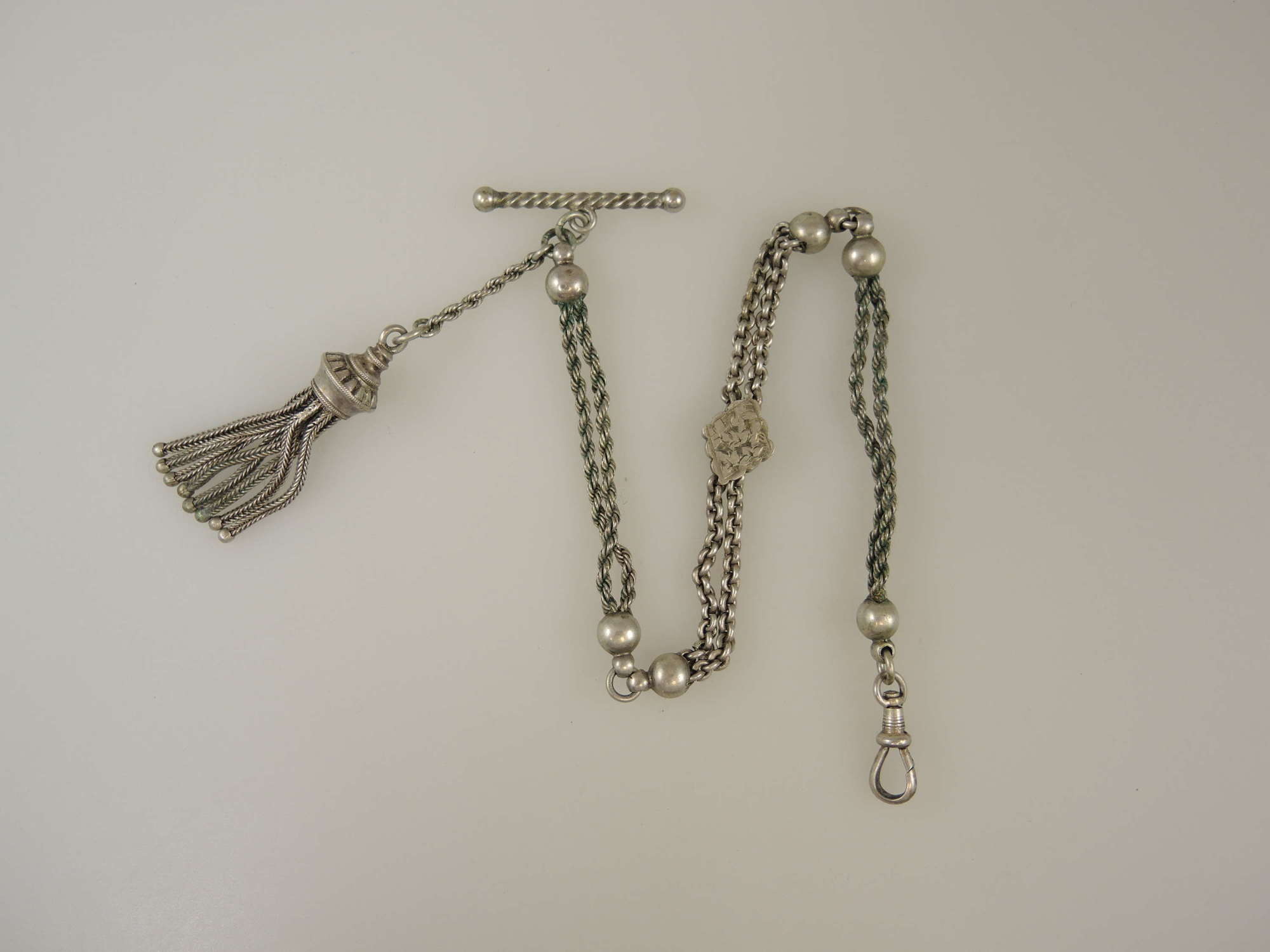 Fancy silver Albertina watch chain. c1890