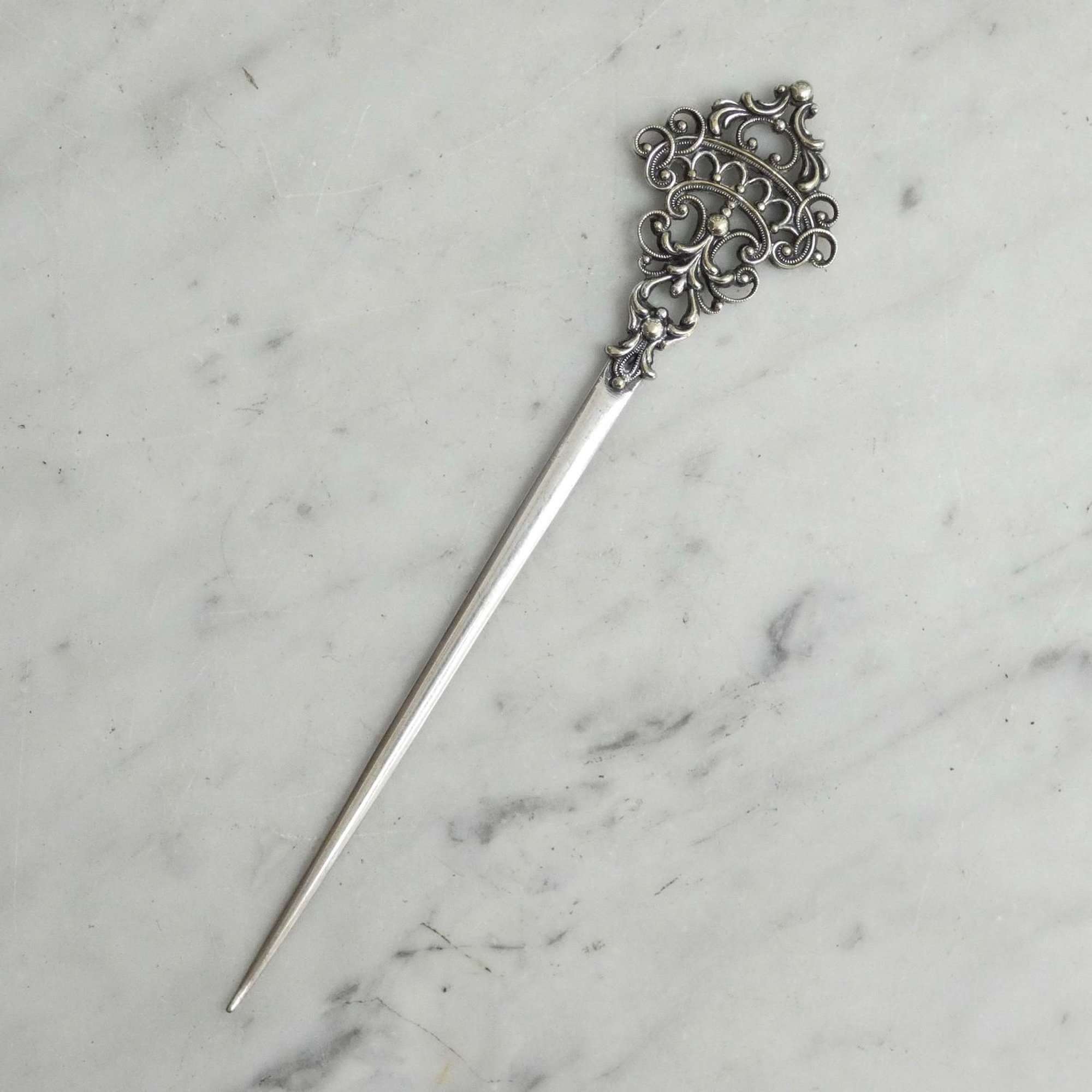 Classical, silver plated skewer