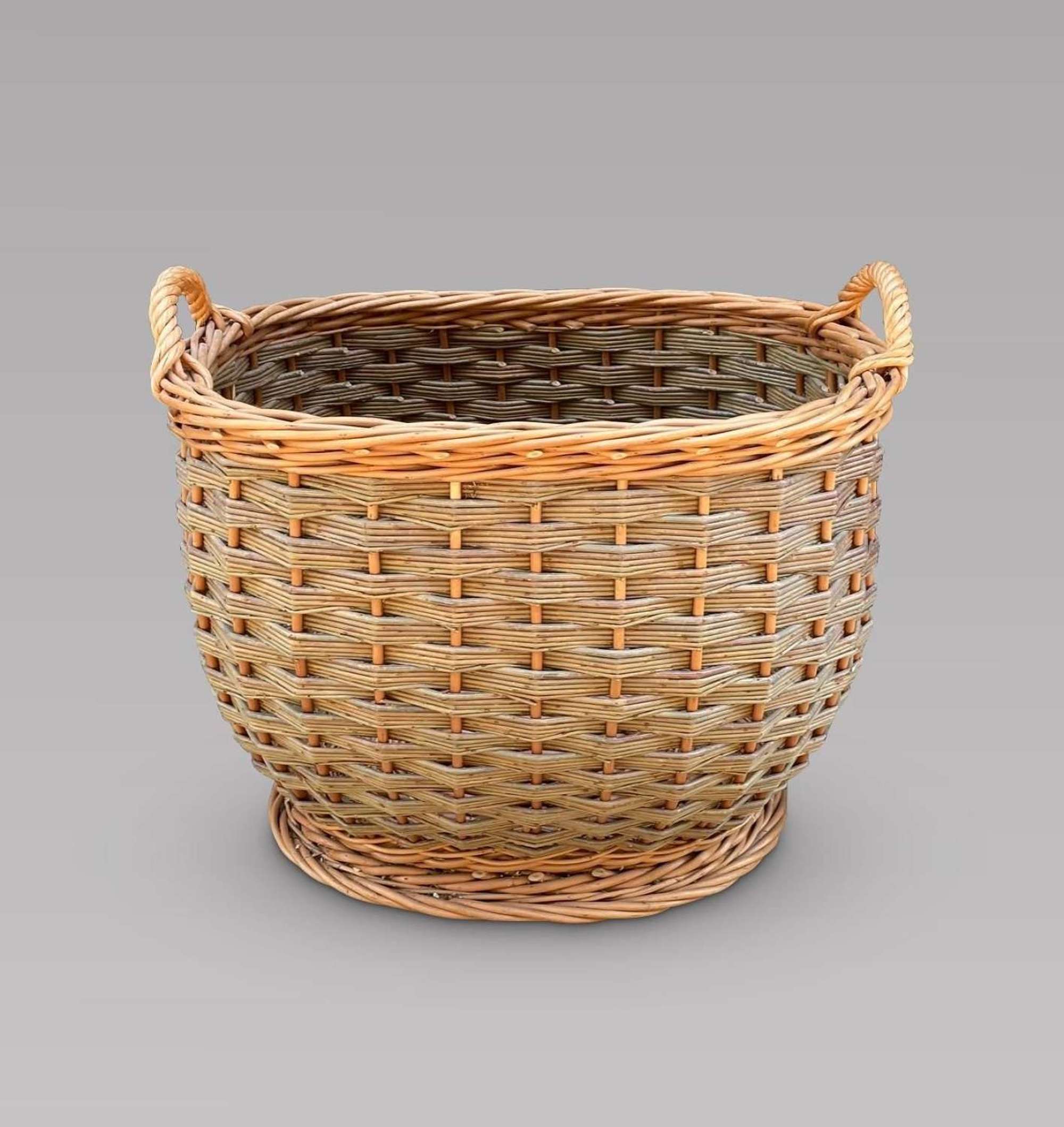 A Good Sized Oval Wicker Basket with Handles
