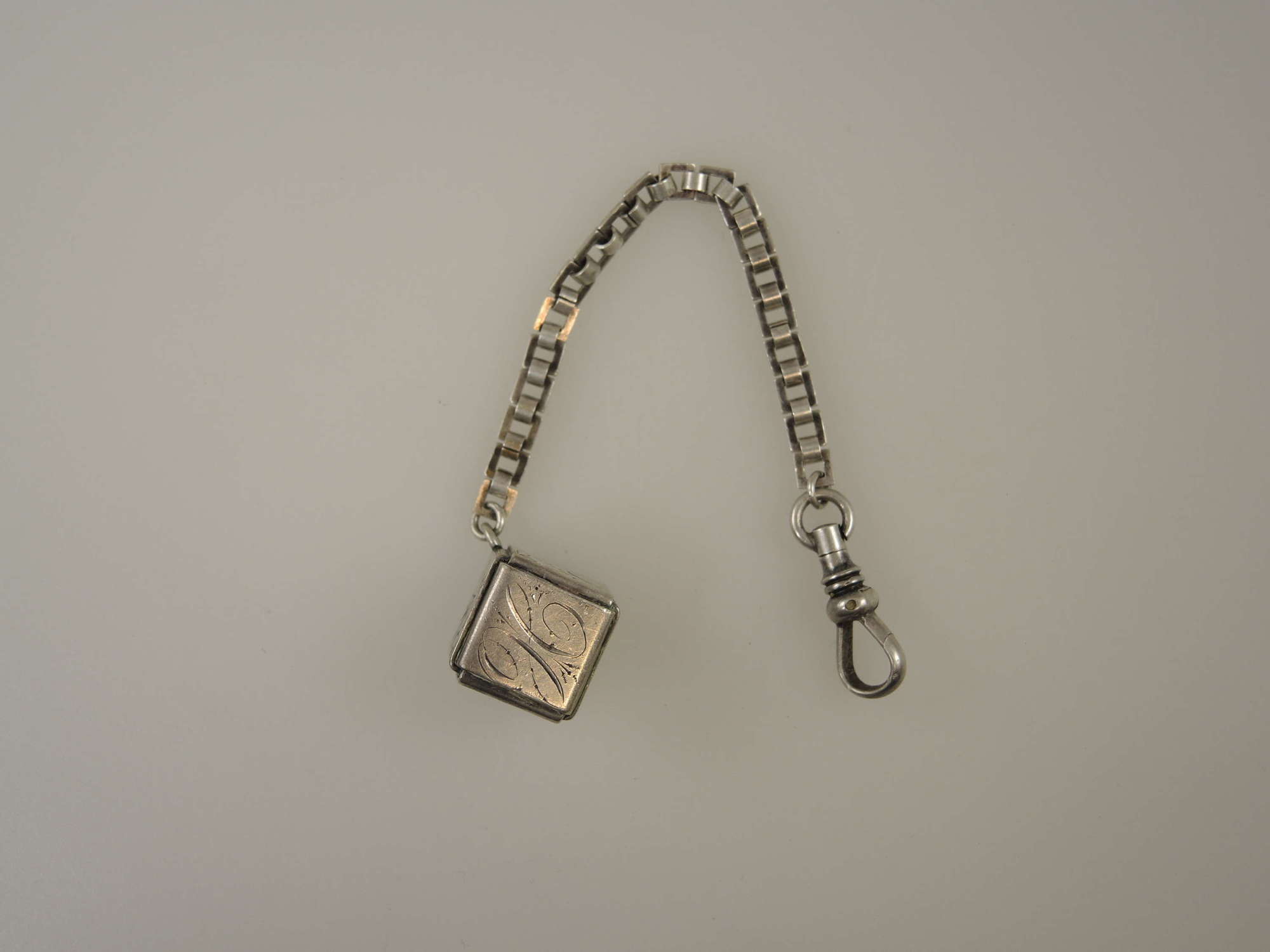 Vintage watch chain with Japanese themed cubed fob c1910