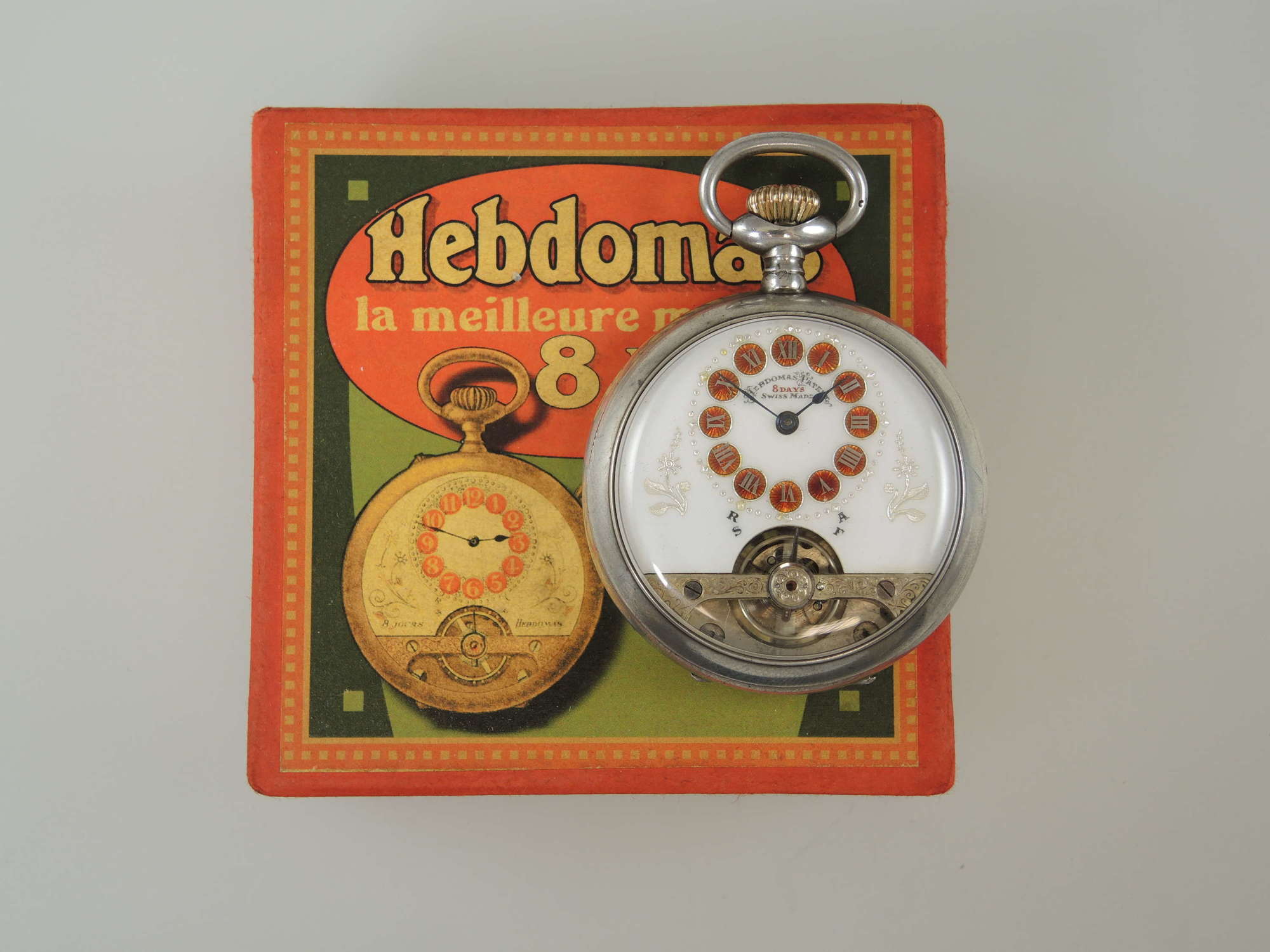 Silver Hebdomas 8 day pocket watch with red enamel dial & box c1915