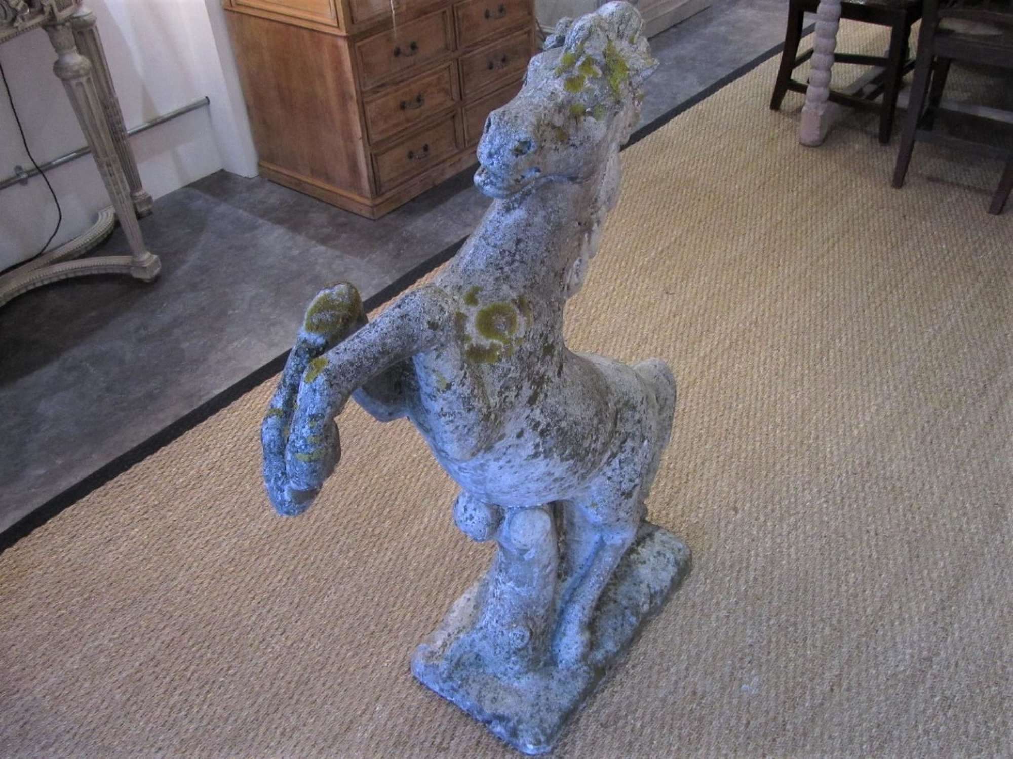 A prancing horse garden statue