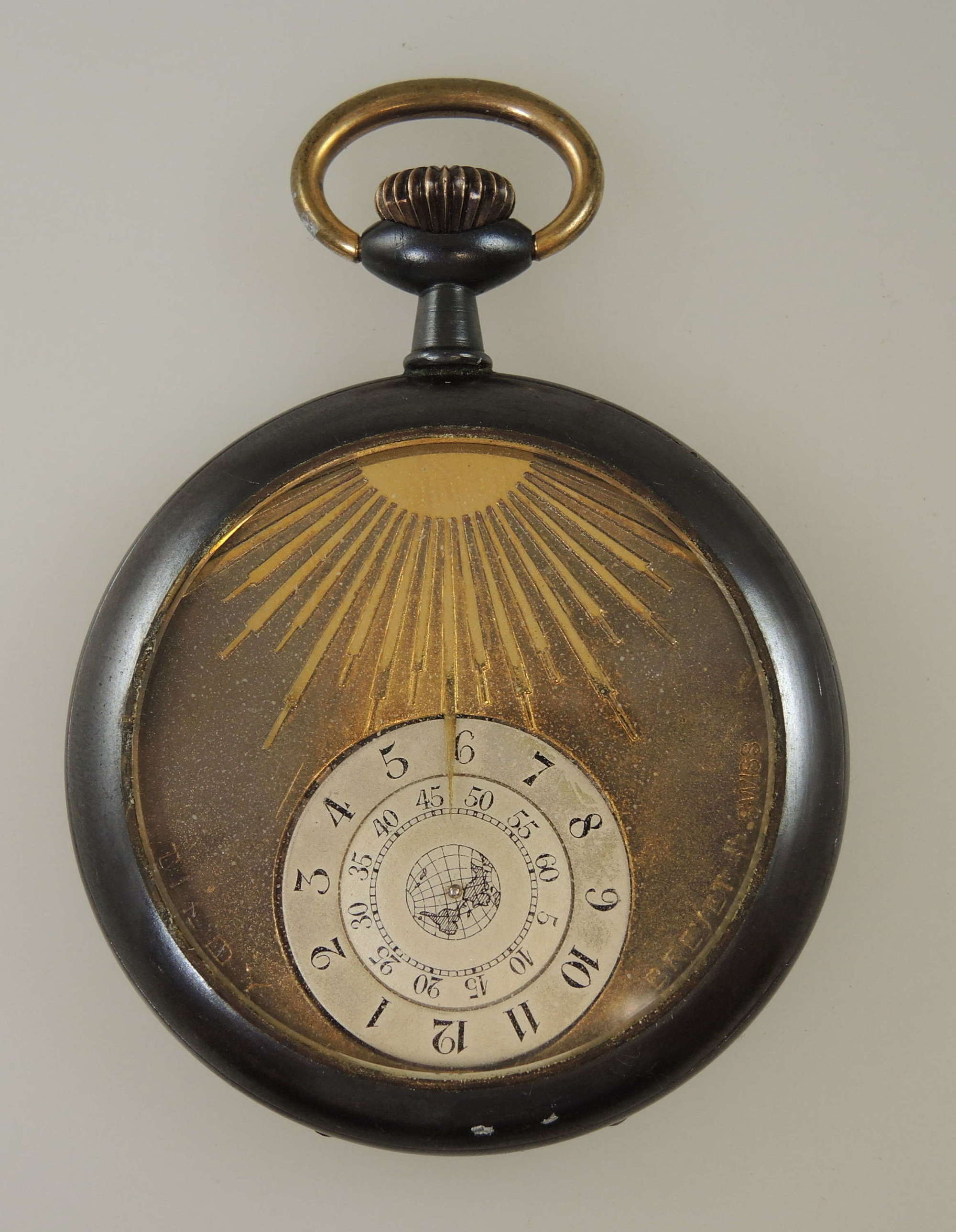 Rare revolving dial pocket watch with sunburst dial c1910