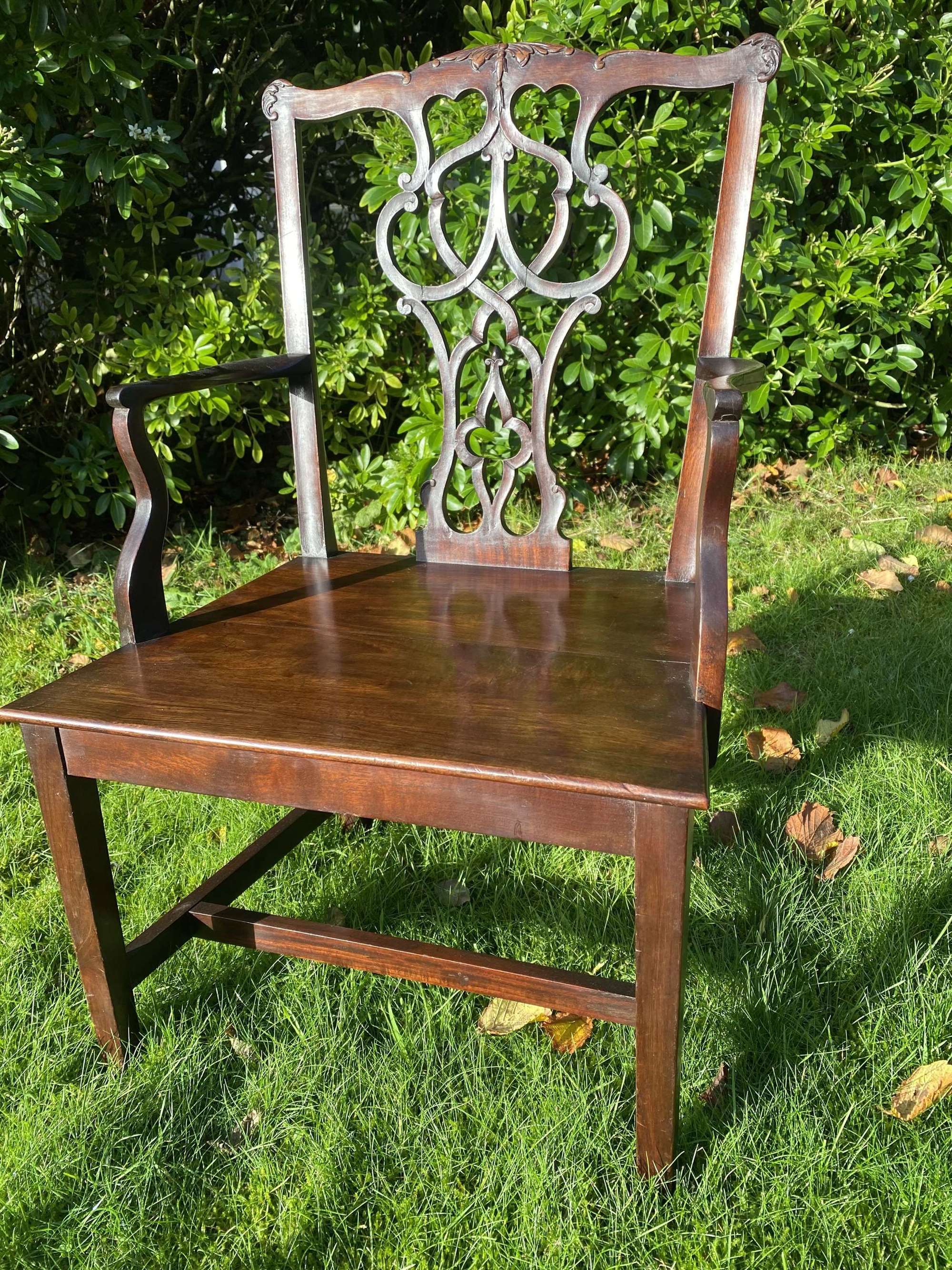 Carved mahogany child’s armchair