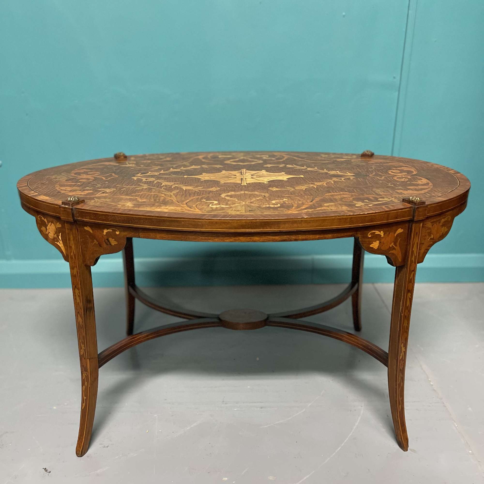 Oval marquetry coffee table by Greenwood & sons