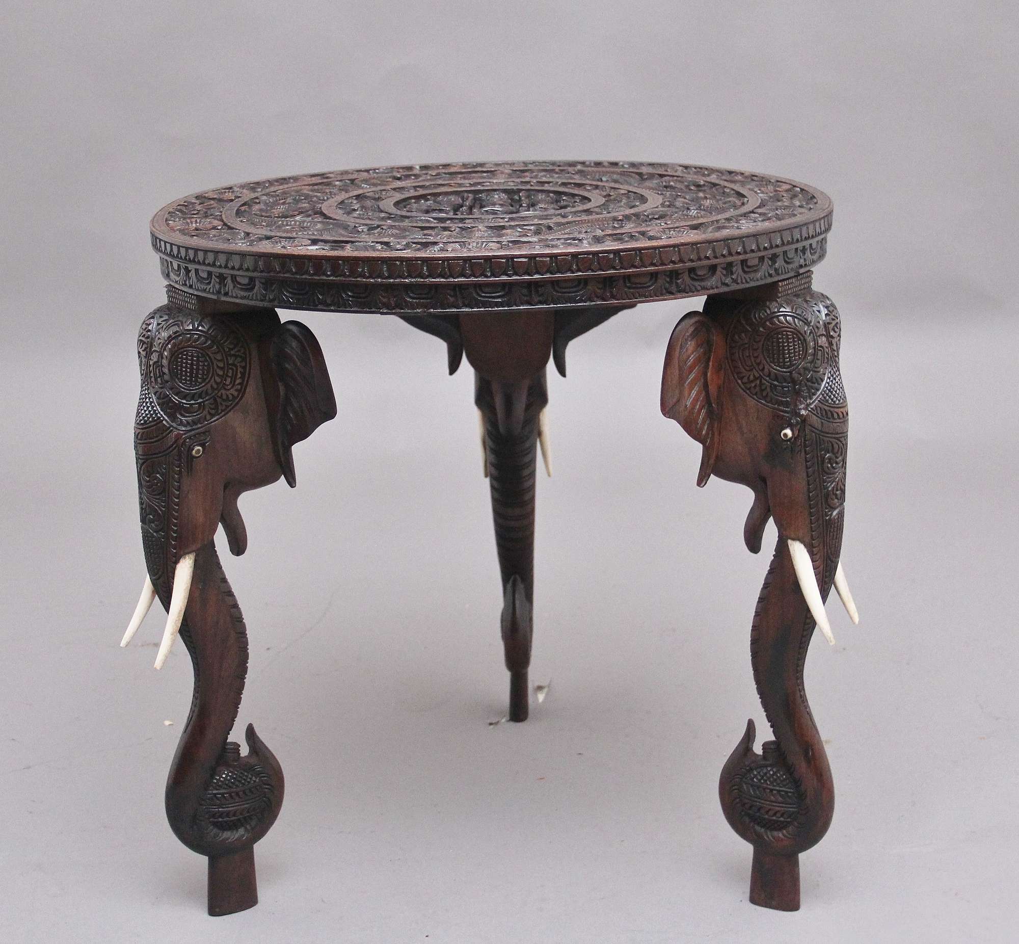 A Superb Quality 19th Century Anglo-indian Carved Elephant Occasional Table