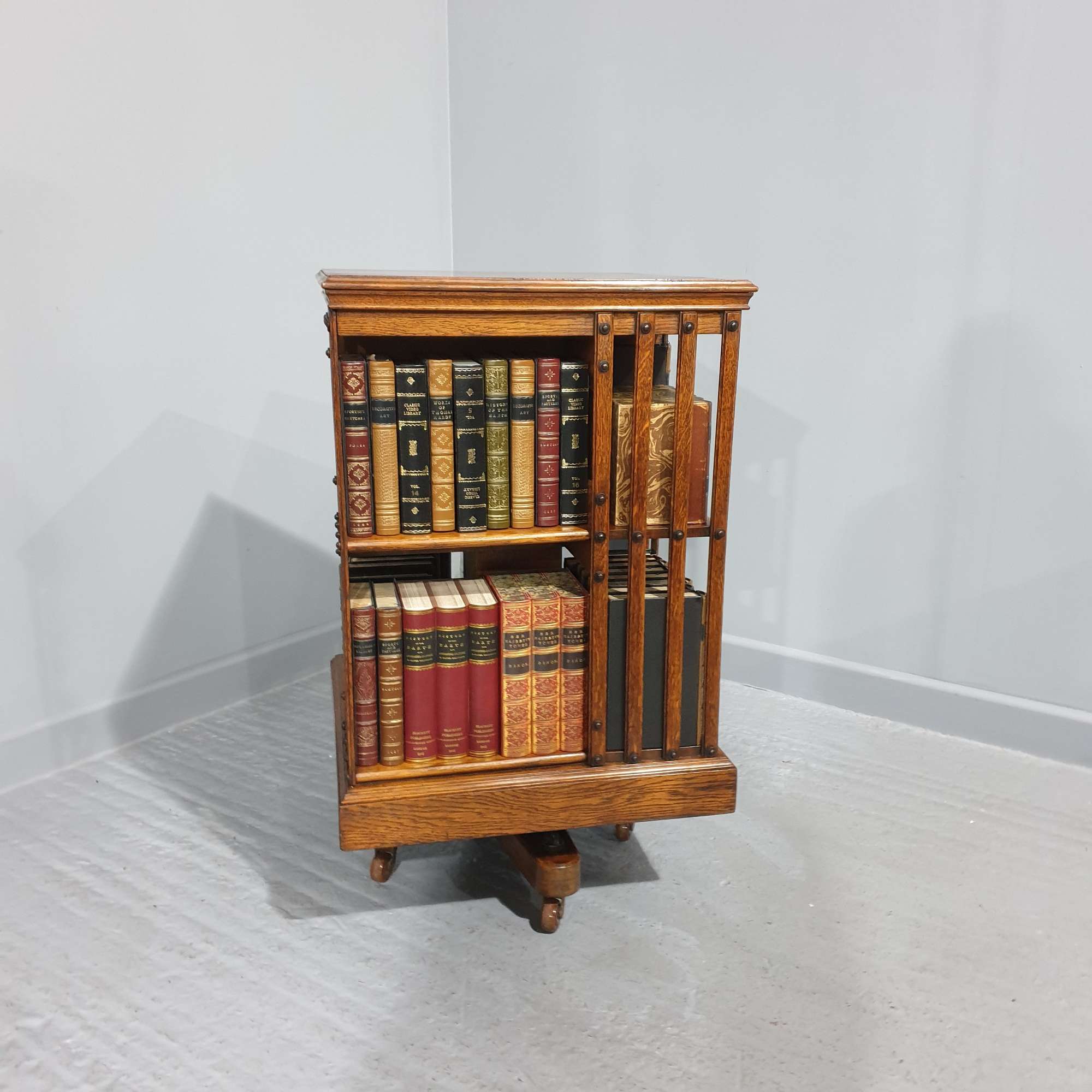Iron Framed Revolving Oak Antique Bookcase