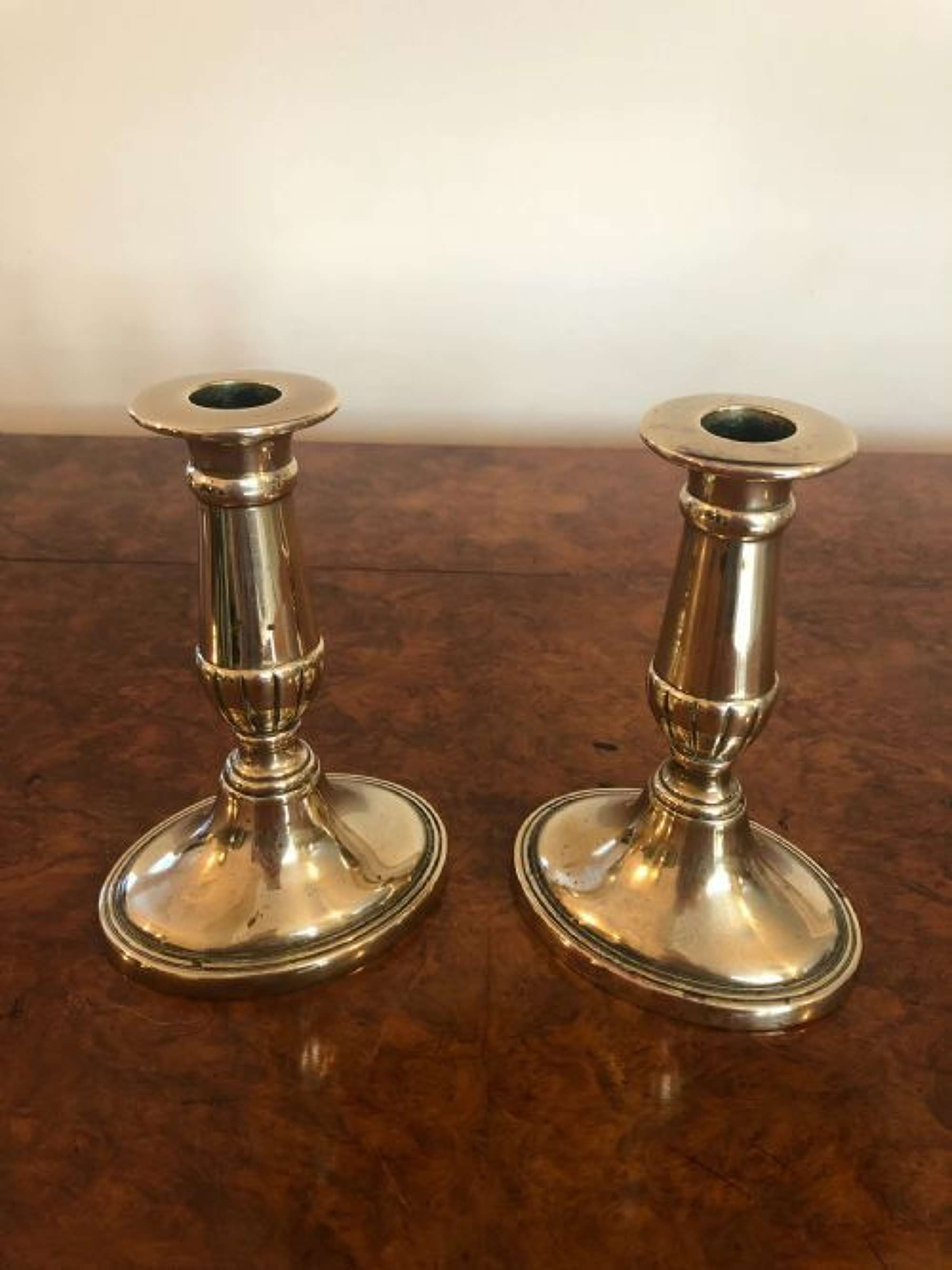 Quality Pair Of George Iii Oval Based Brass Candlesticks