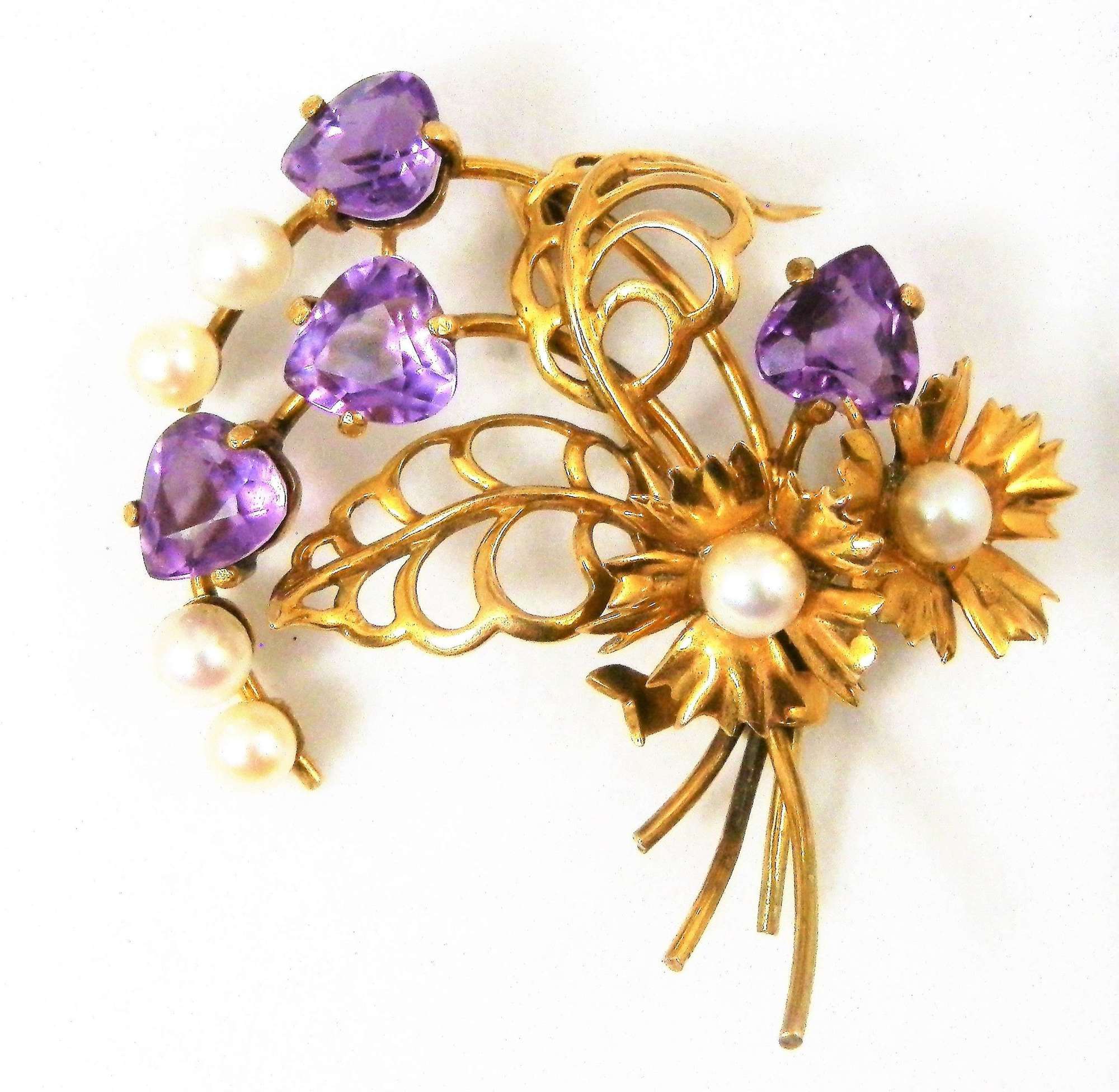 Gold, Amethyst and pearl spray of flowers brooch.