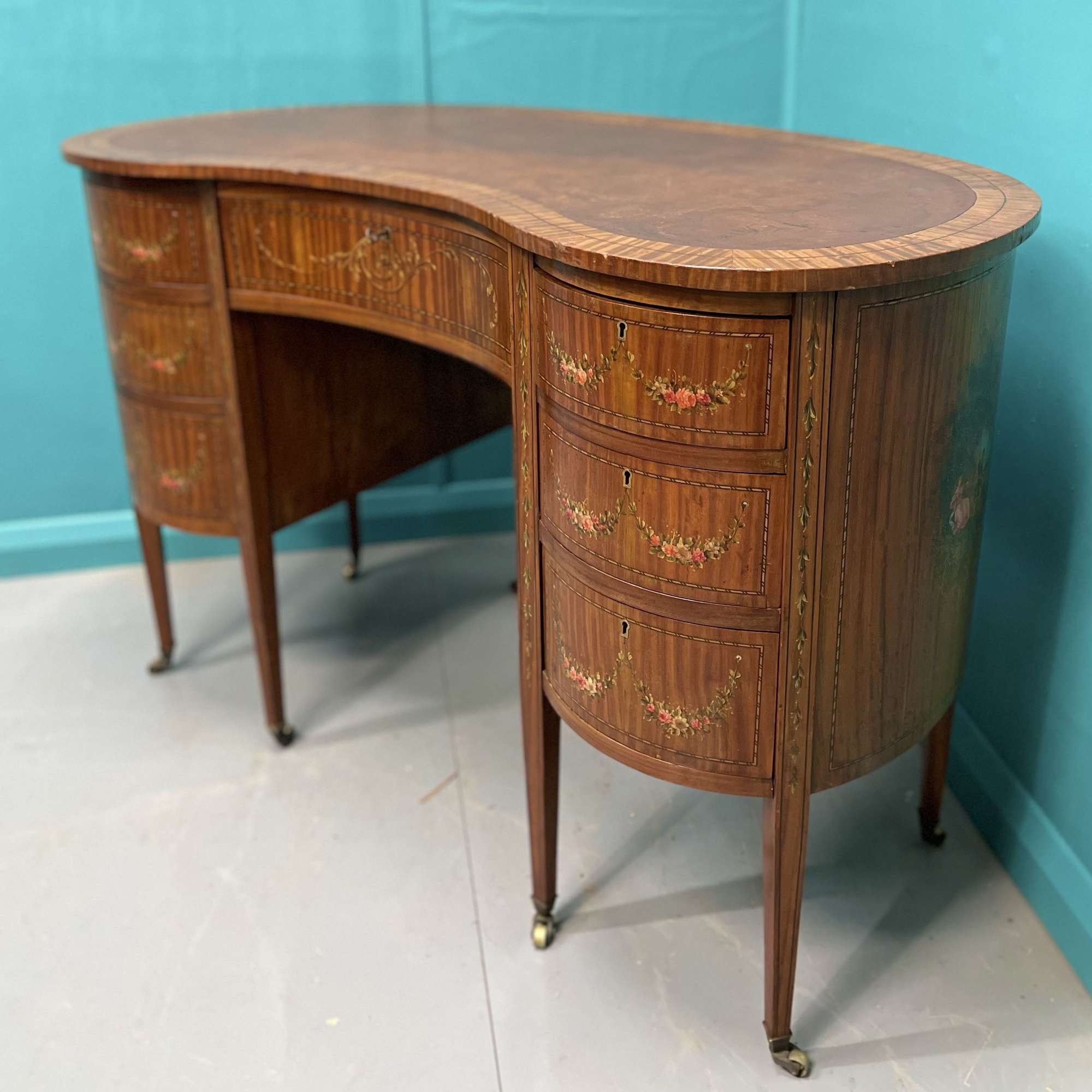English satinwood kidney shape desk with original paint