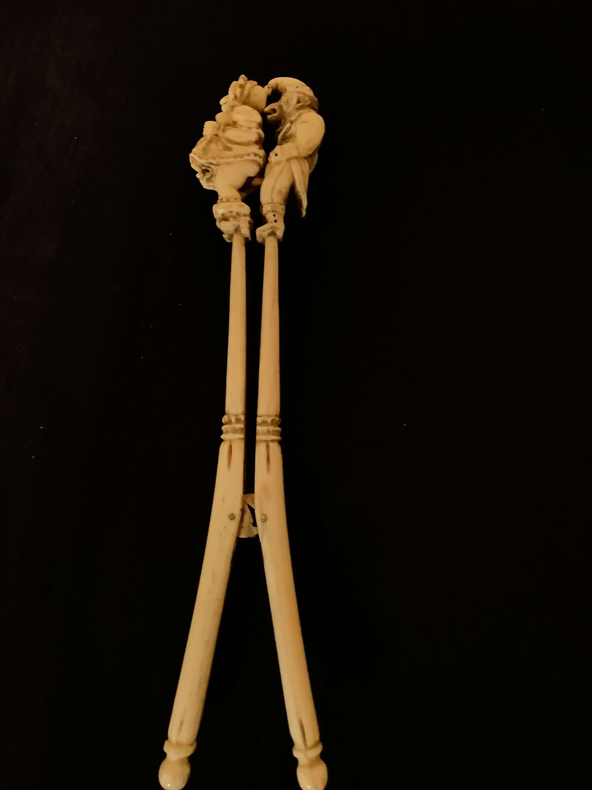 A well carved and amusing prisoner of war erotic bone glove stretcher