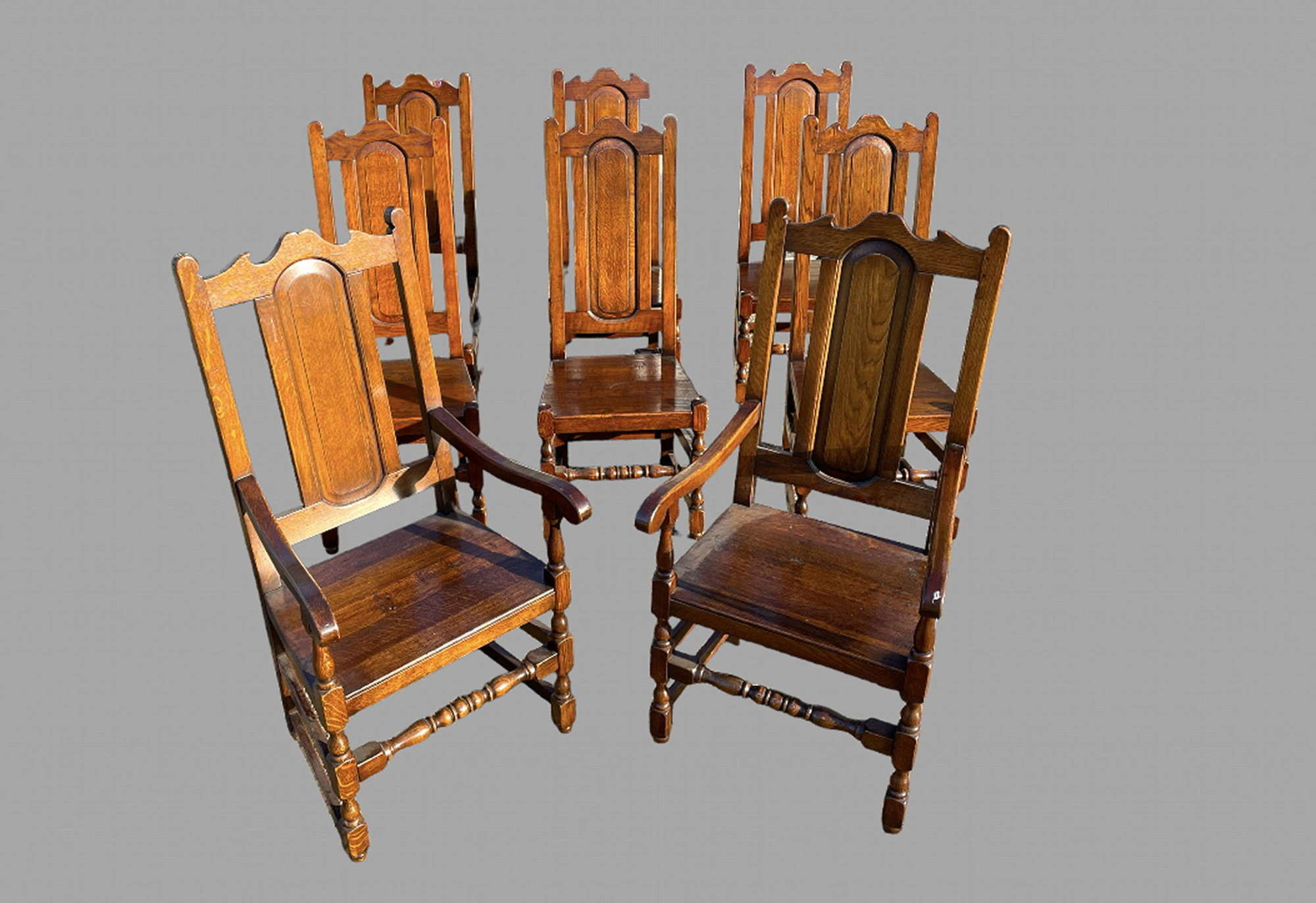 A Set of Eight Oak Dining Chairs