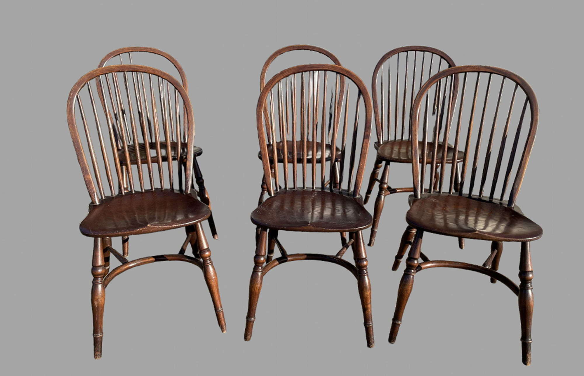 A Set of Six Spindle Back Oak Chairs