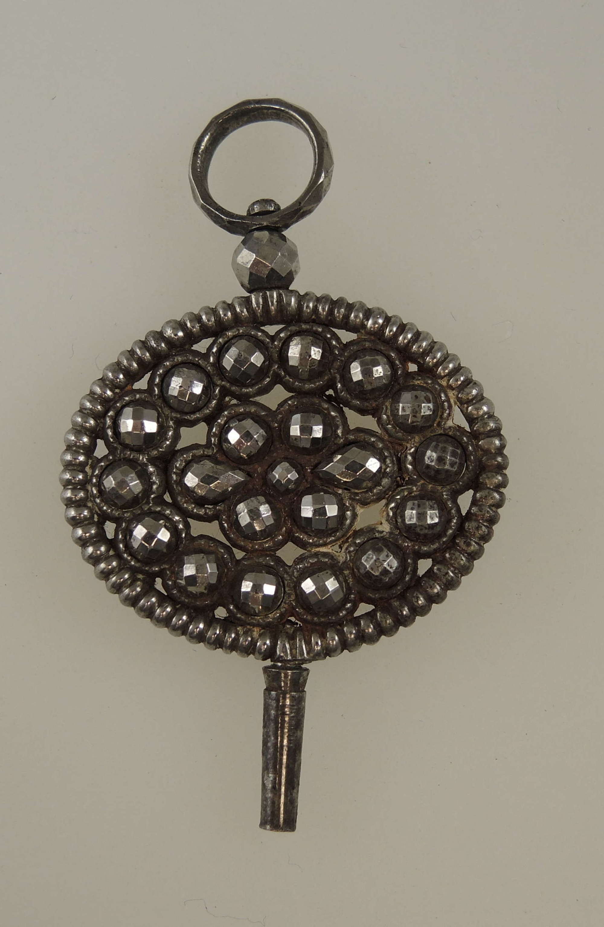 Early cut steel and glass pocket watch key c1750