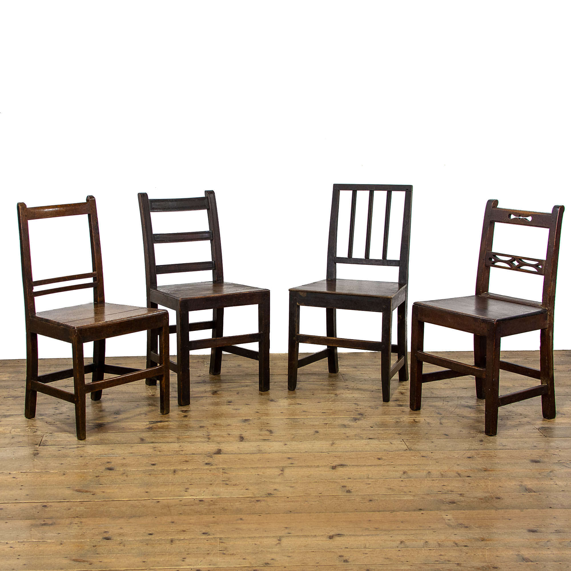 Harlequin Set Of Four Antique Welsh Oak Farmhouse Chairs
