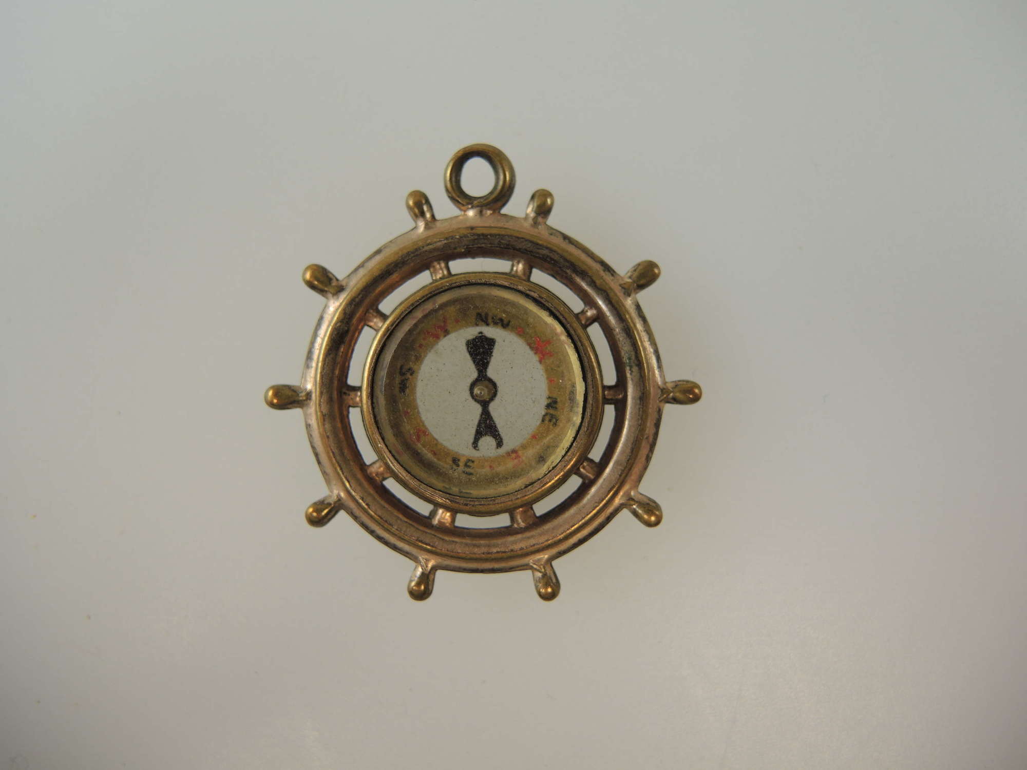 Gilt Victorian ships wheel compass fob c1890