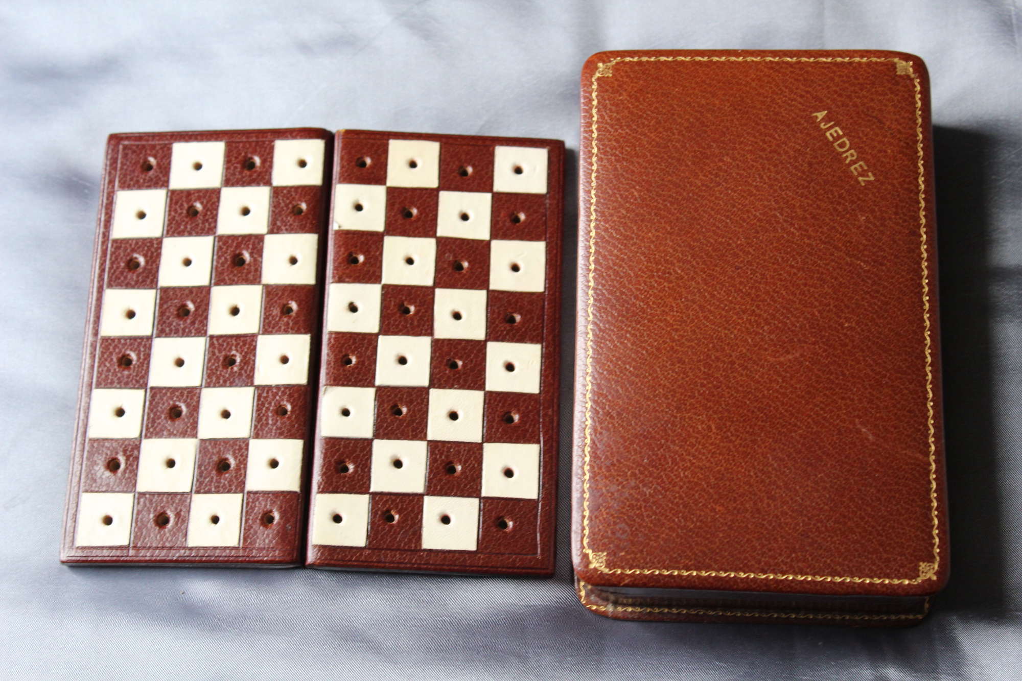 A Very Fine Quality Miniature Travelling Chess Set In A Leather Case