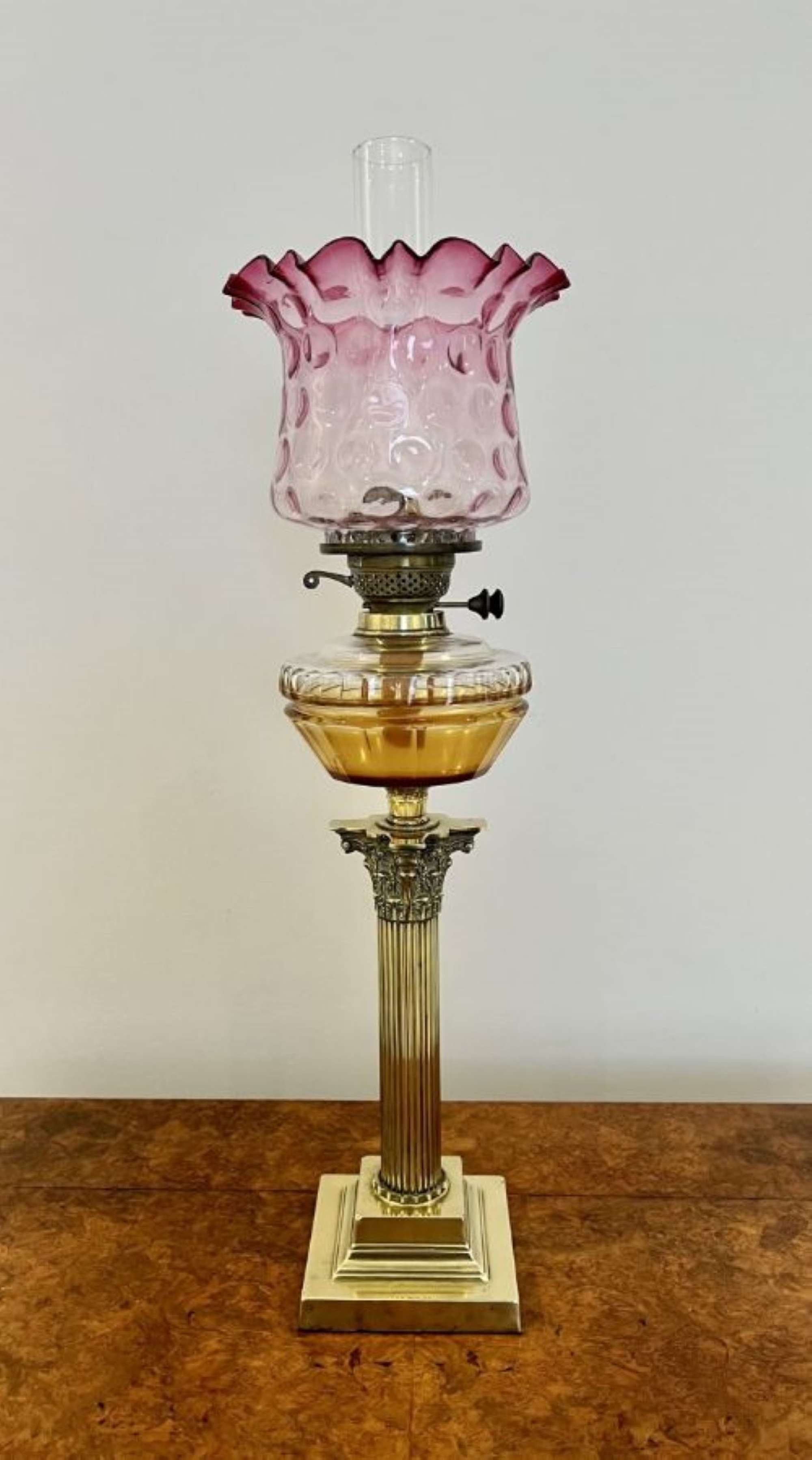 Fantastic quality antique Victorian brass oil lamp with a cranberry glass shade