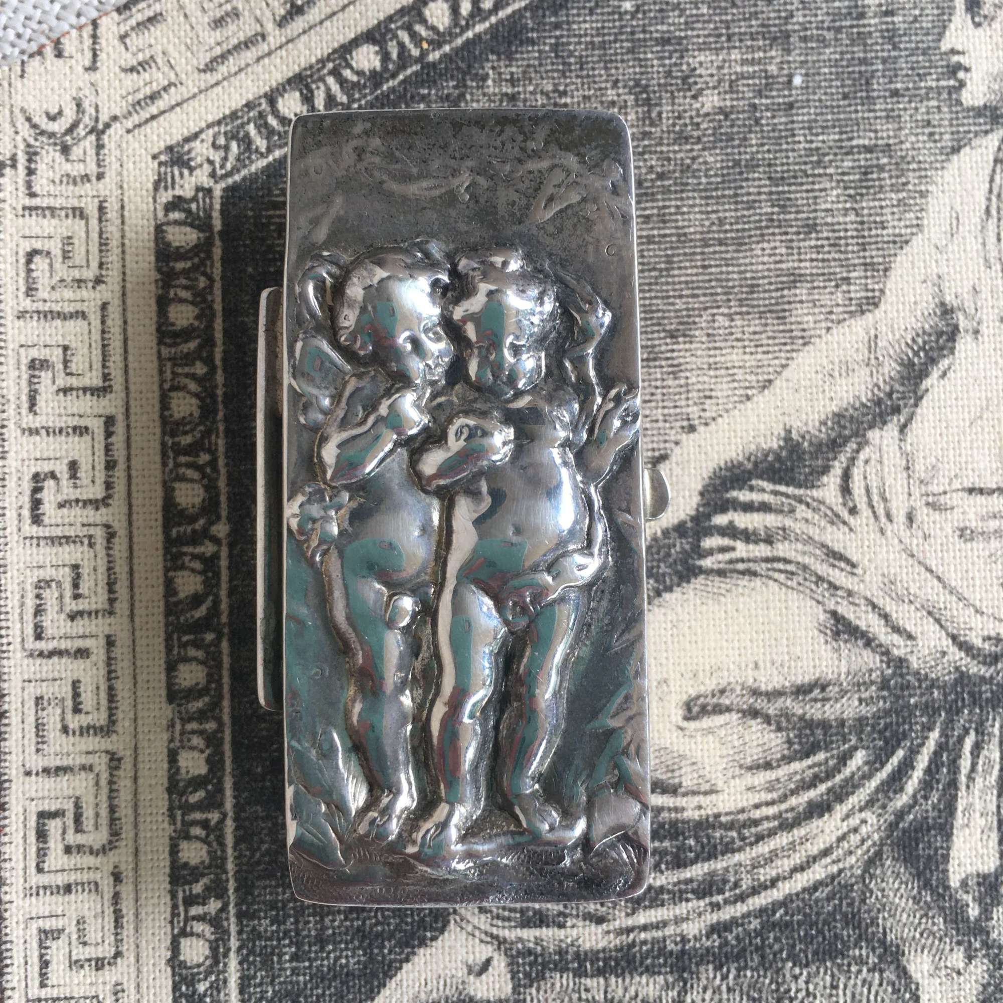 Vintage silver box with two cherubs