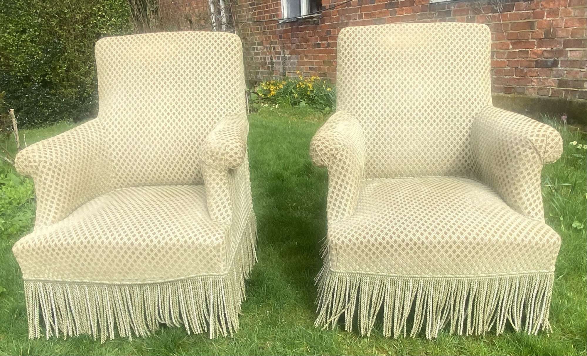 Pair of French upholstered armchairs
