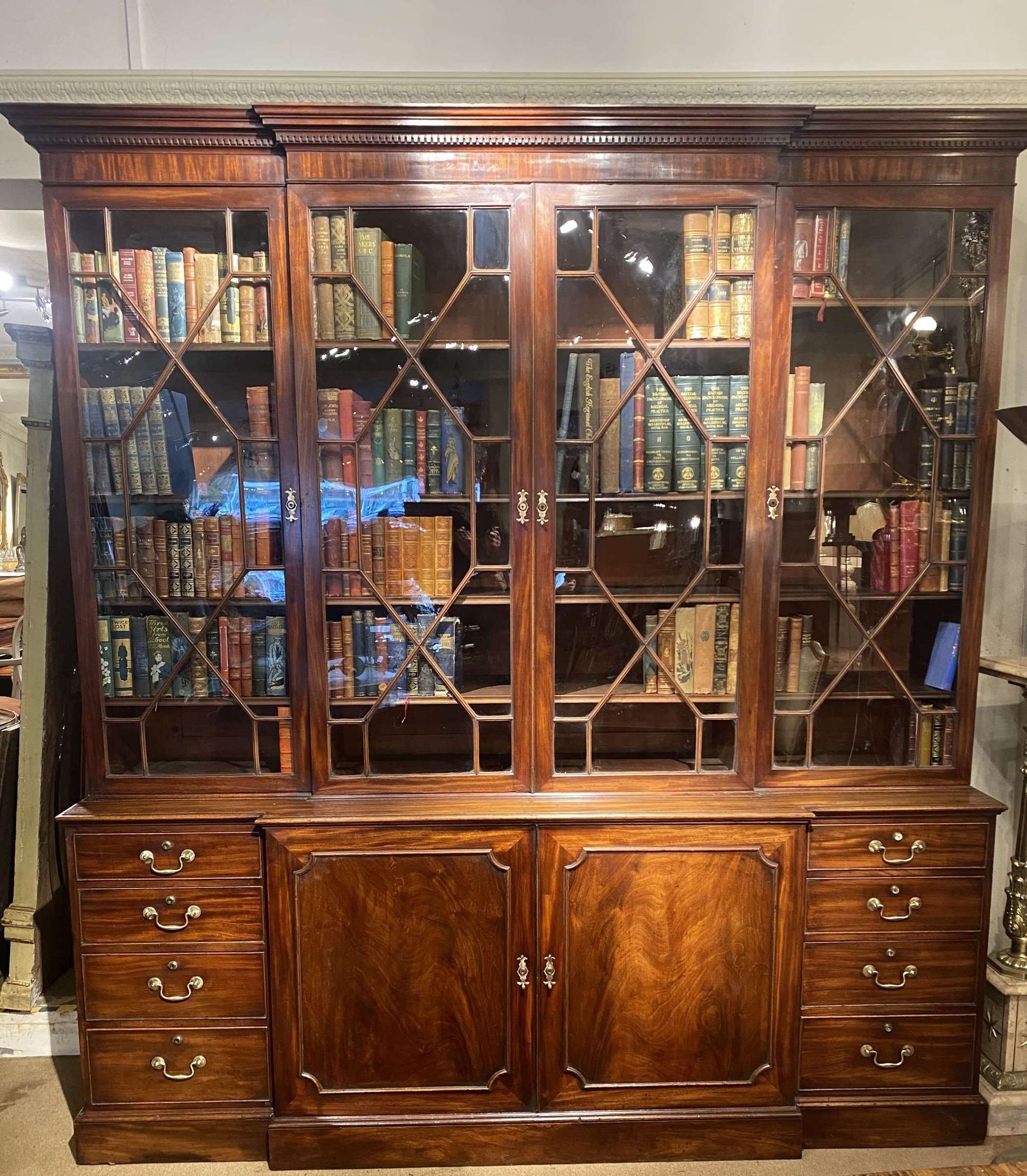 18th Century Breakfront bookcase in flame mahogany