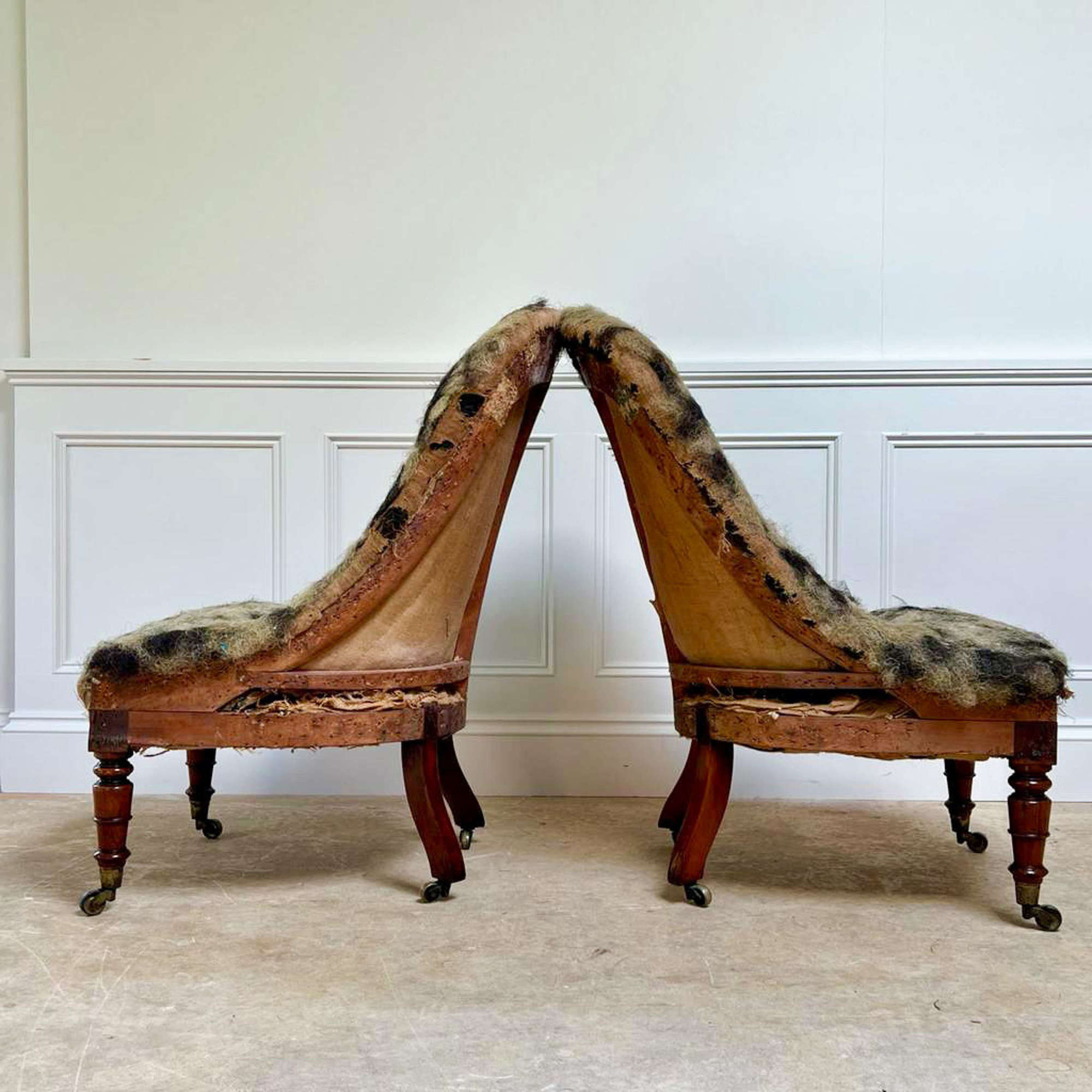 A Pair of George IV Rosewood Slipper Chairs