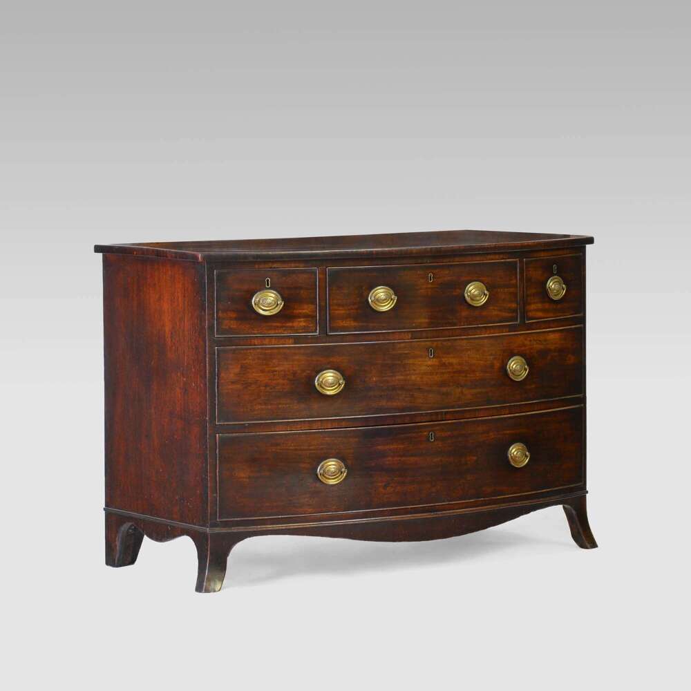 Georgian mahogany bowfront commode chest with writing slide