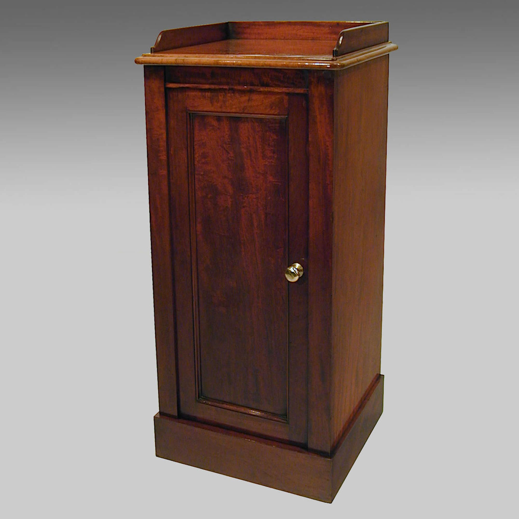 Mahogany pedestal cabinet by Holland & Sons