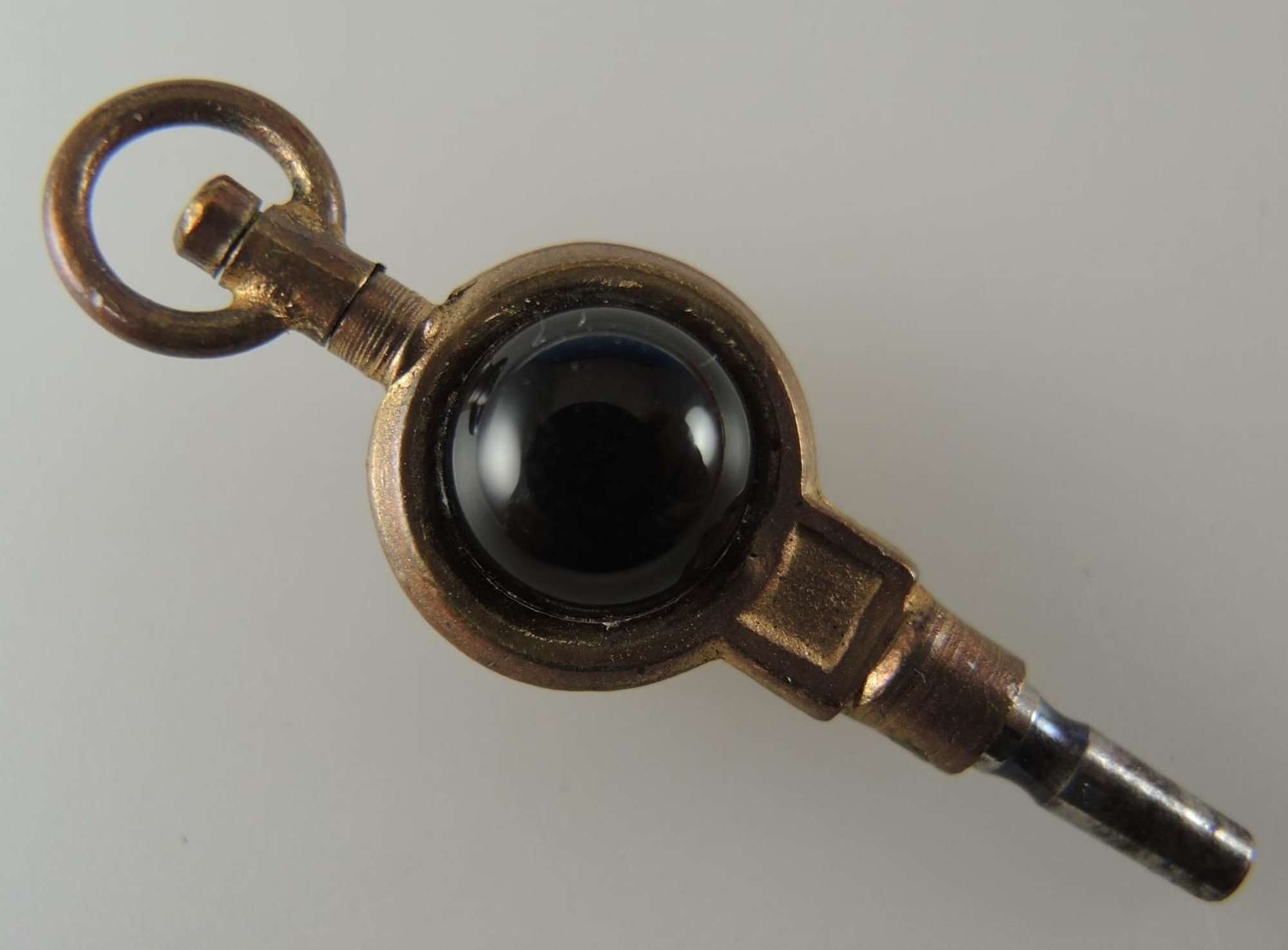 Gilt and Glass Set Pocket Watch Key. Circa 1890