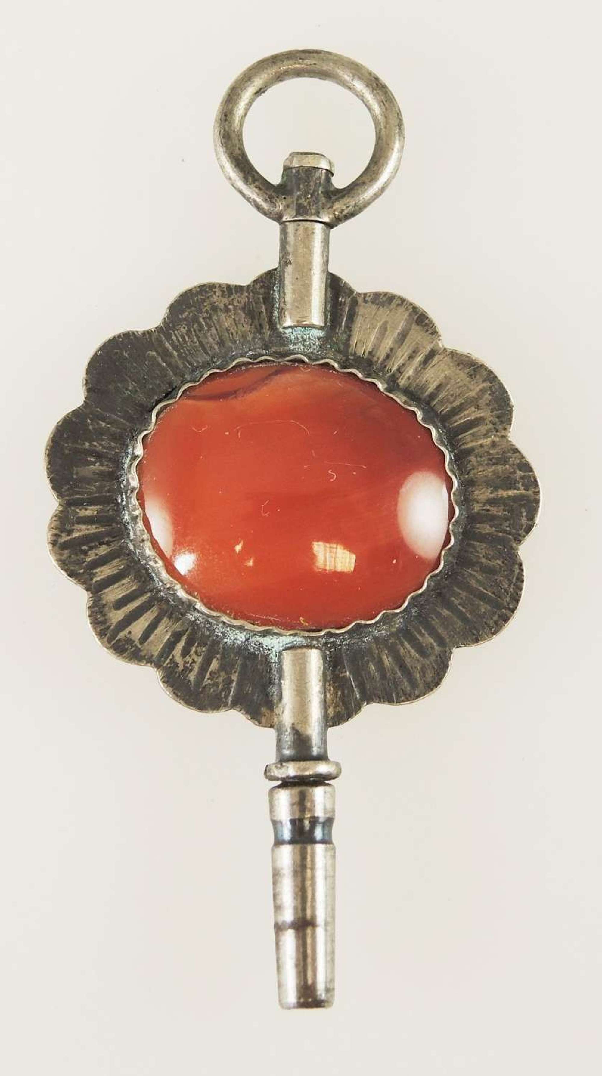 Silver and red stone watch key. c1880