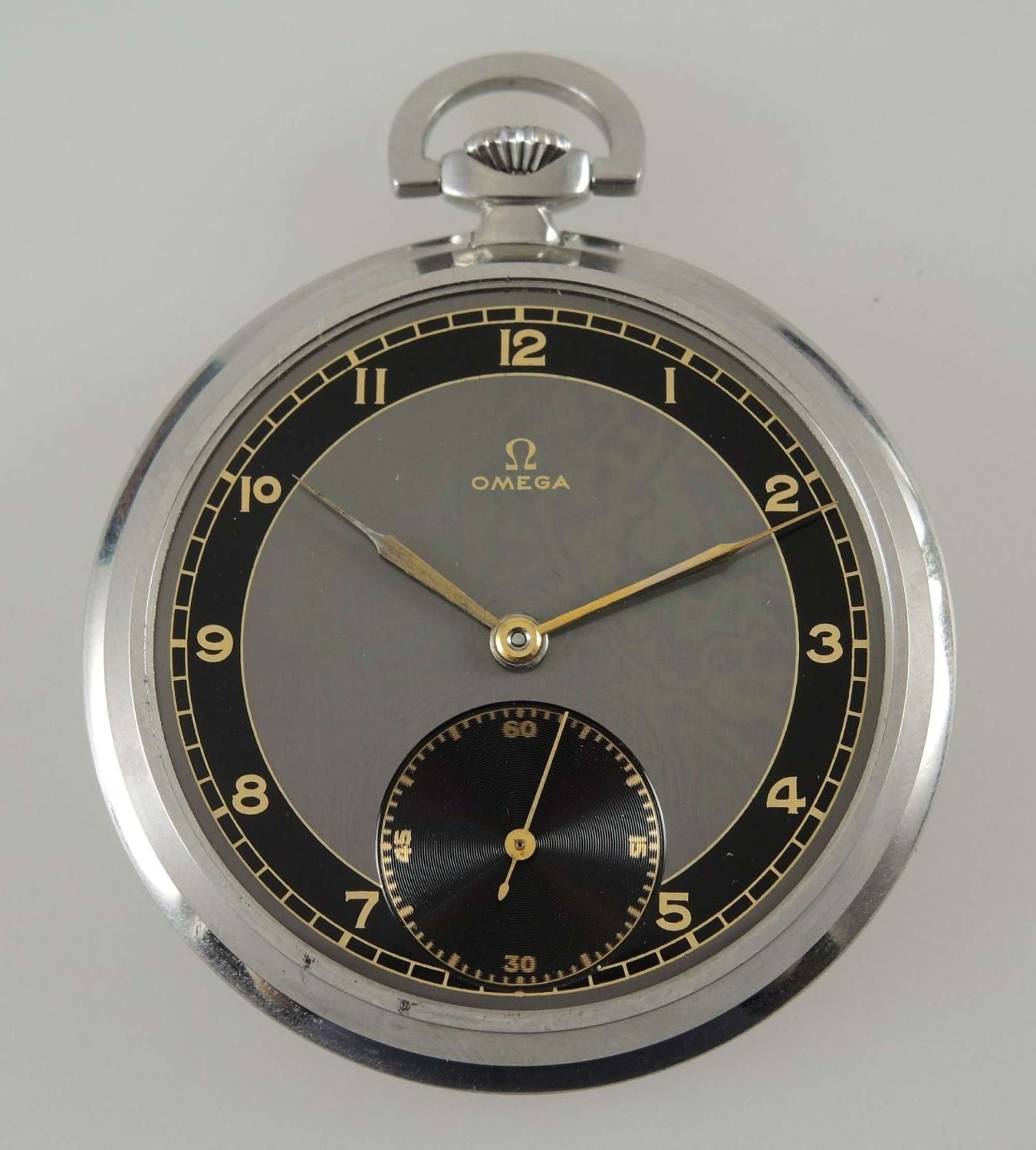 Steel OMEGA pocket watch with a black dial. Plus Vintage Box c1942