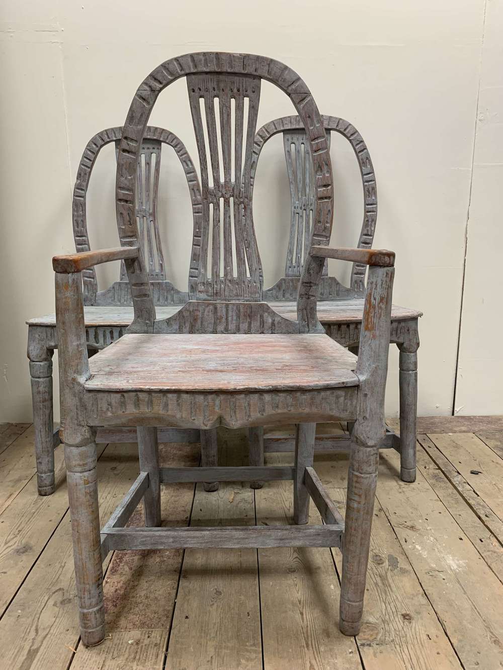 Three C19th painted Swedish folk chairs
