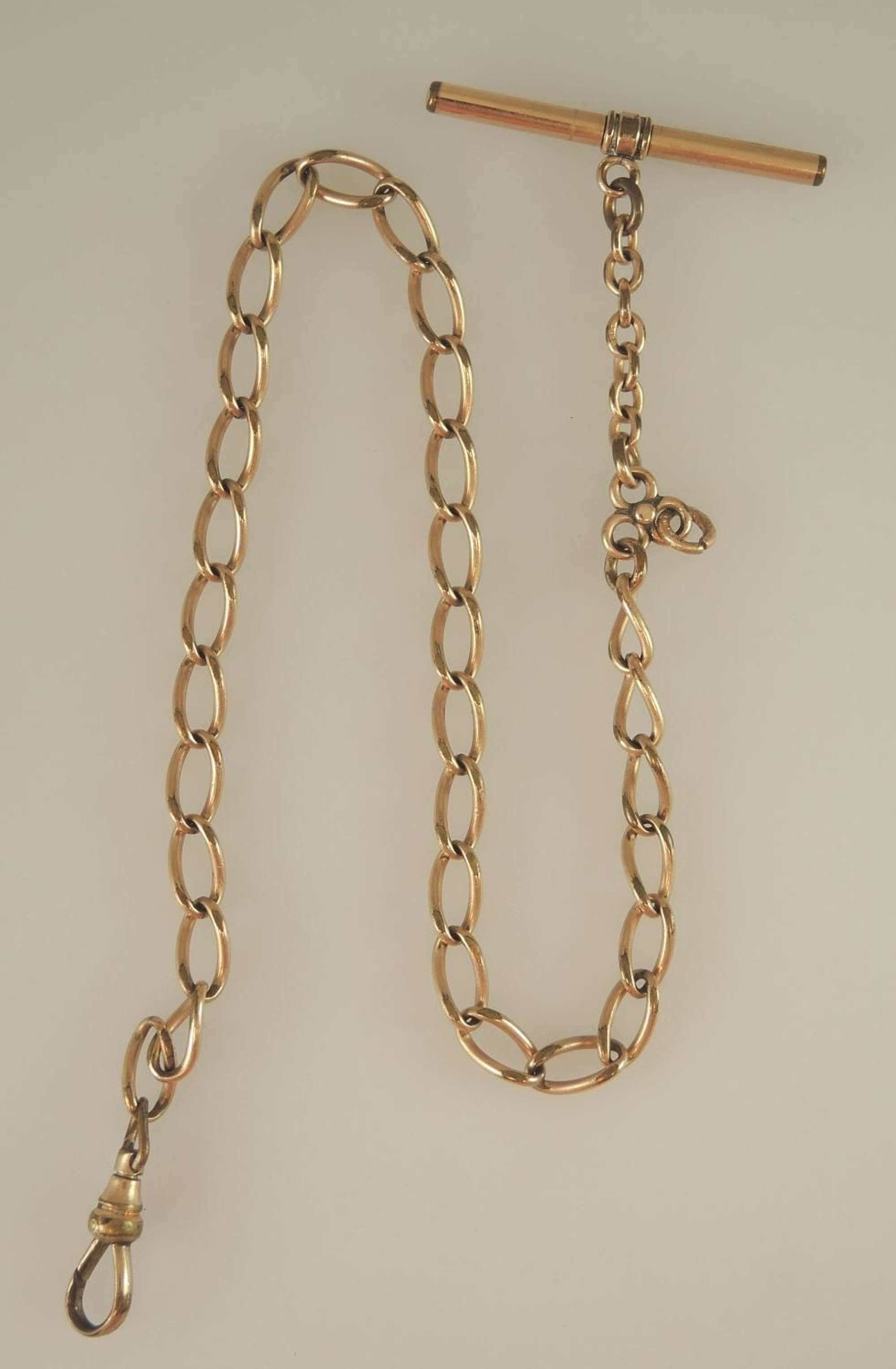 Rose gold plated watch chain c1890