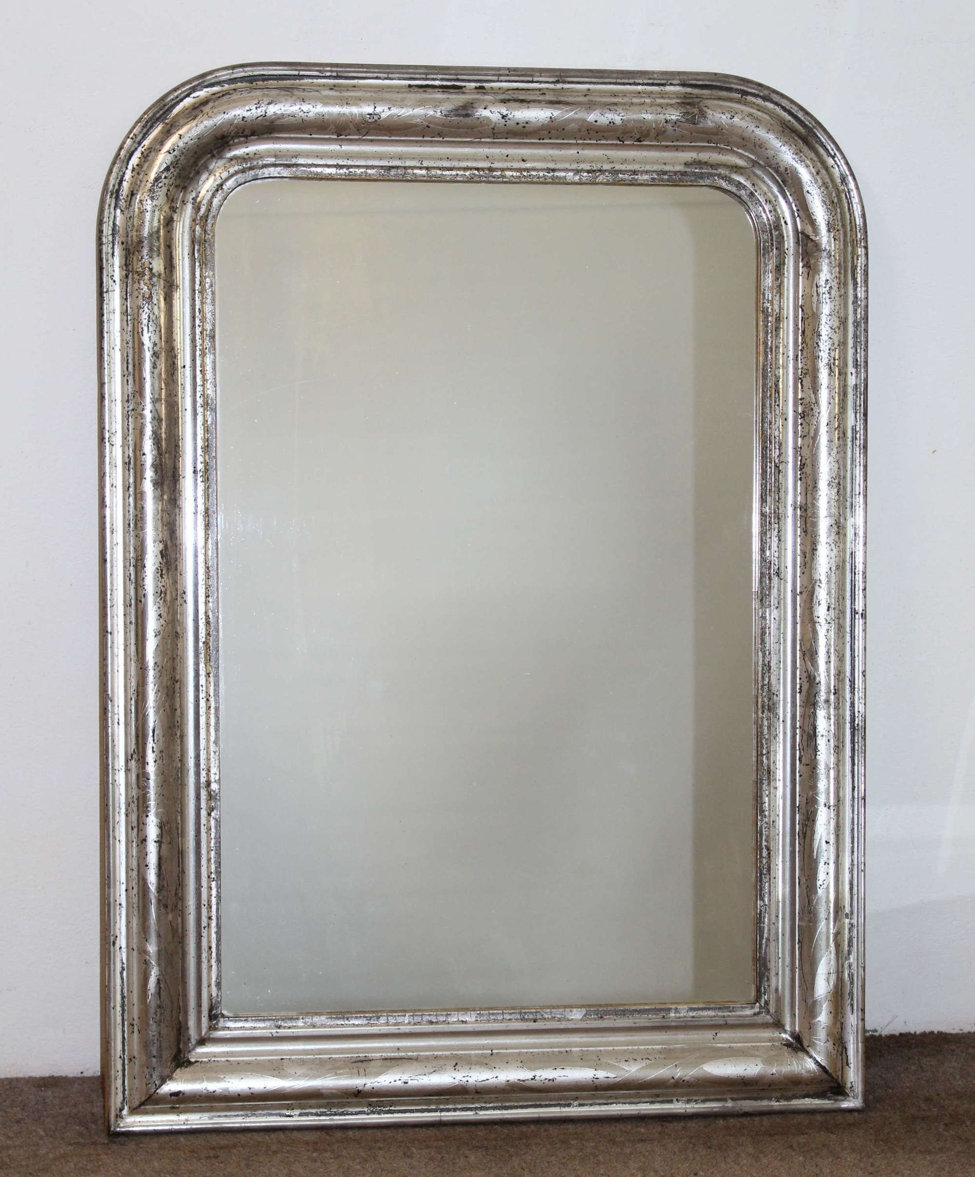Antique French silverleafed archtop mirror