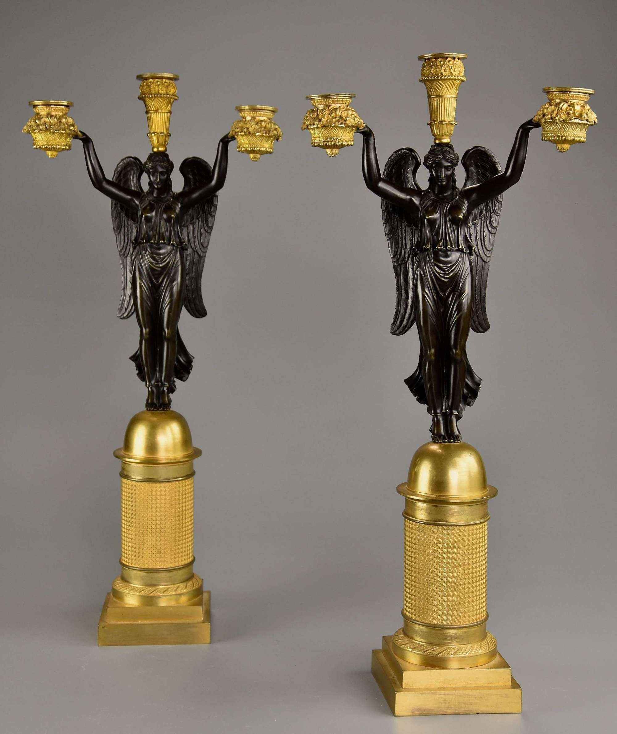 Pair of French Empire bronze & gilt-bronze candelabra, signed 'Rabiat'