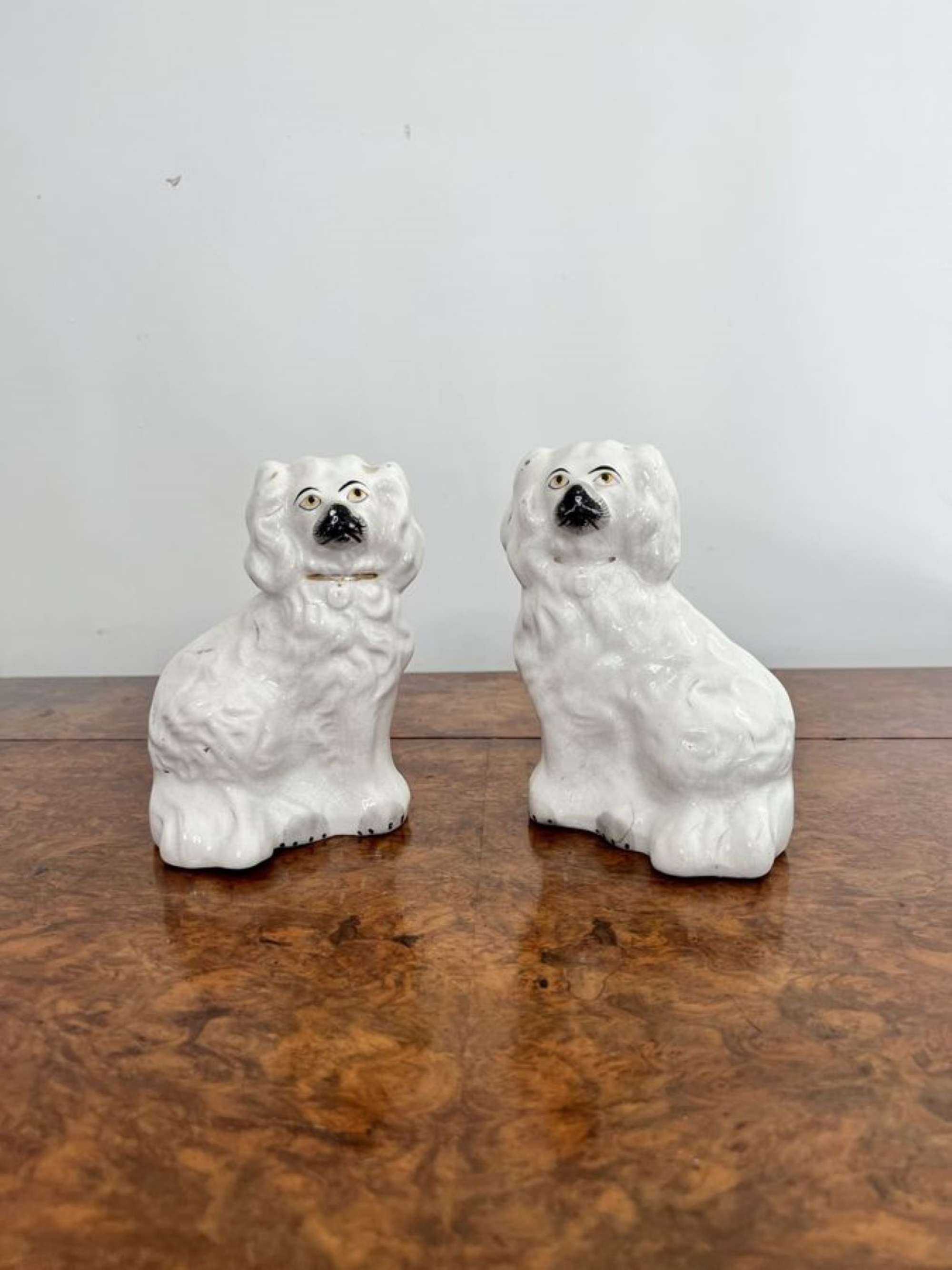 Pair of miniature antique Victorian Staffordshire dogs