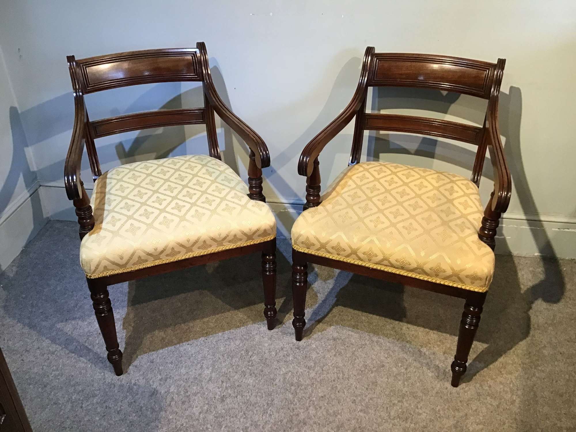 Pair of antique elbow chairs