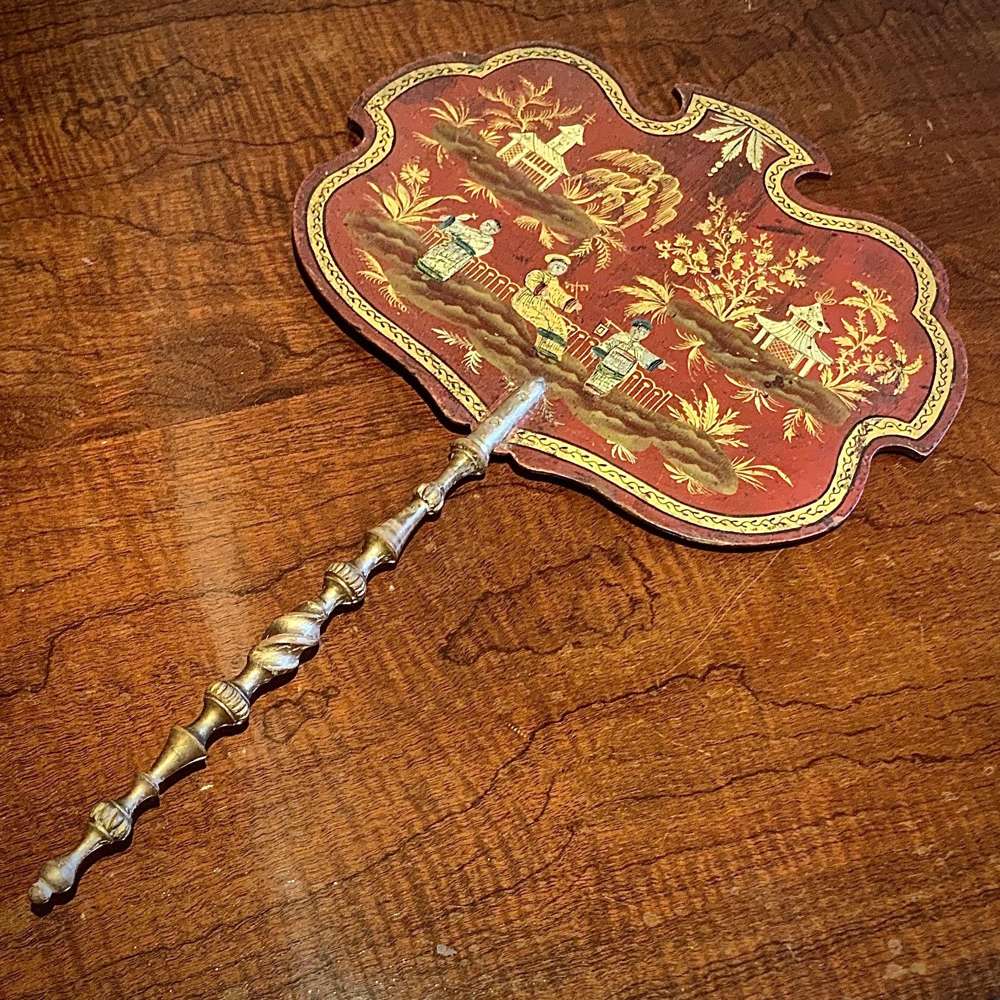 A George III or Regency Red Lacquer Chinoiserie Face Screen